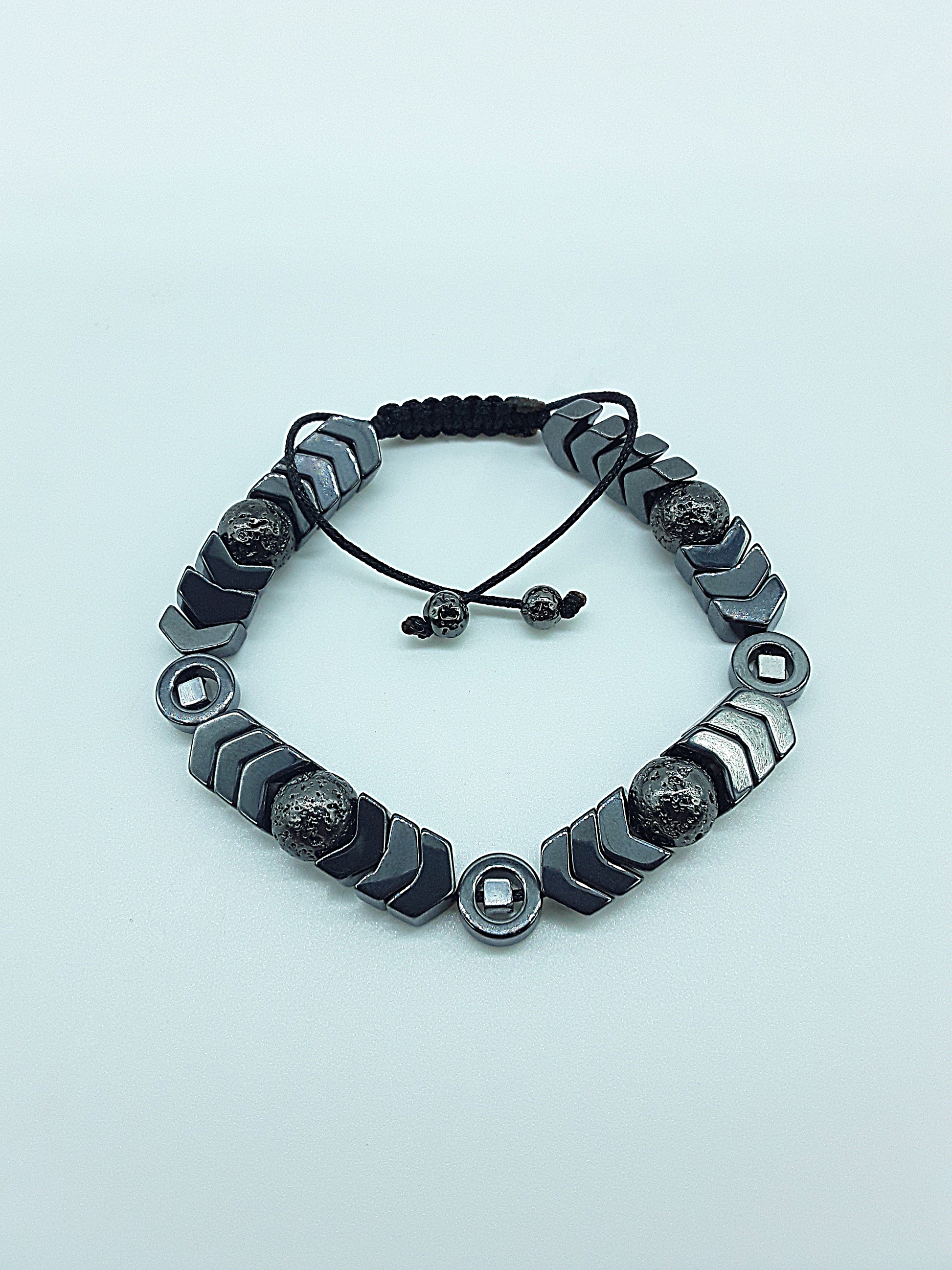 The Ash & Steel Bracelet by Polmadeva – hematite and lava stone bracelet symbolizing resilience, grounding, and rebirth