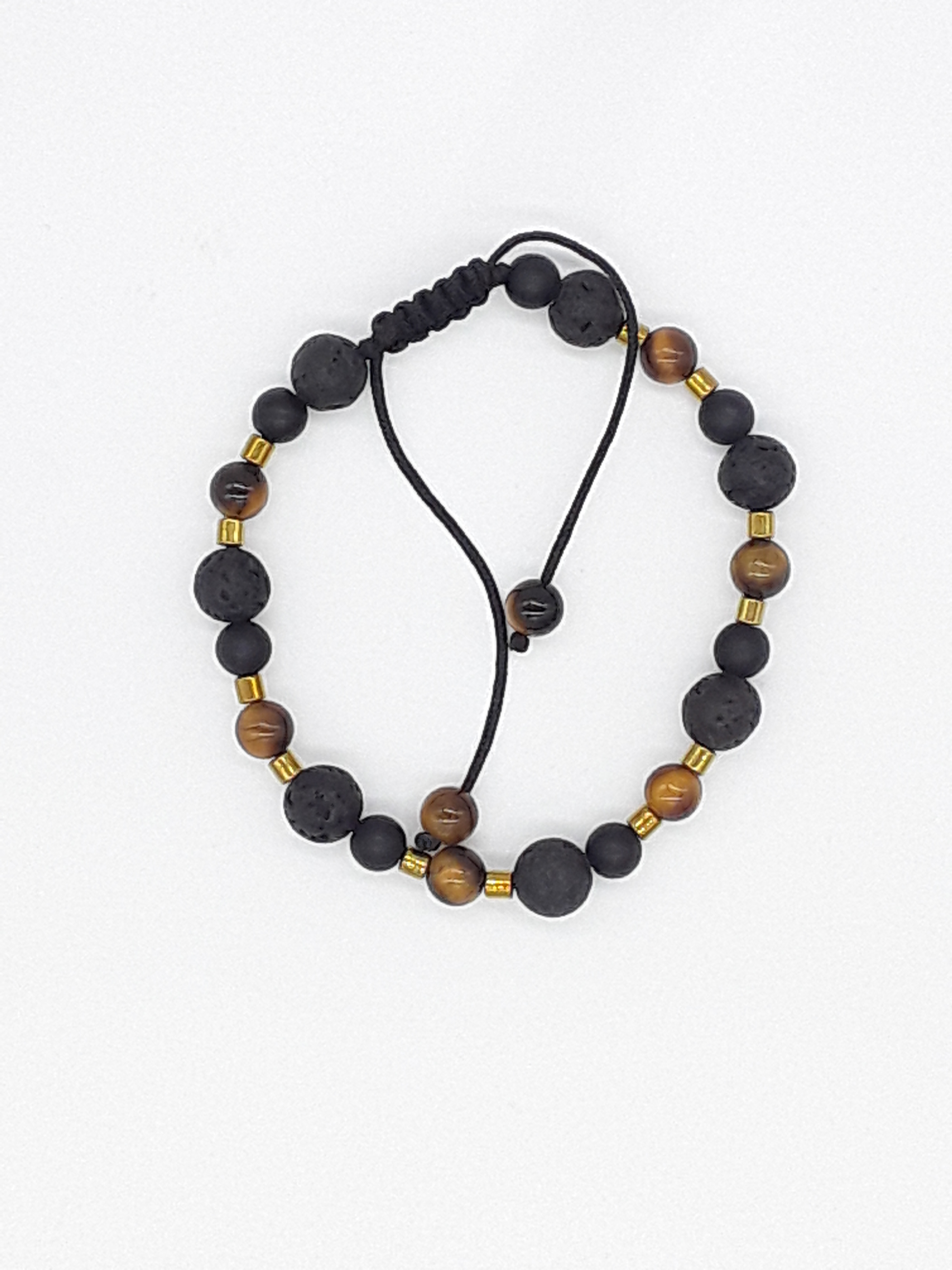 The Fourfold Vision Set by Polmadeva – handcrafted necklace & bracelet with Lava Stone, Tiger’s Eye, Black Onyx & Hematite, symbolizing balance, clarity & endurance.