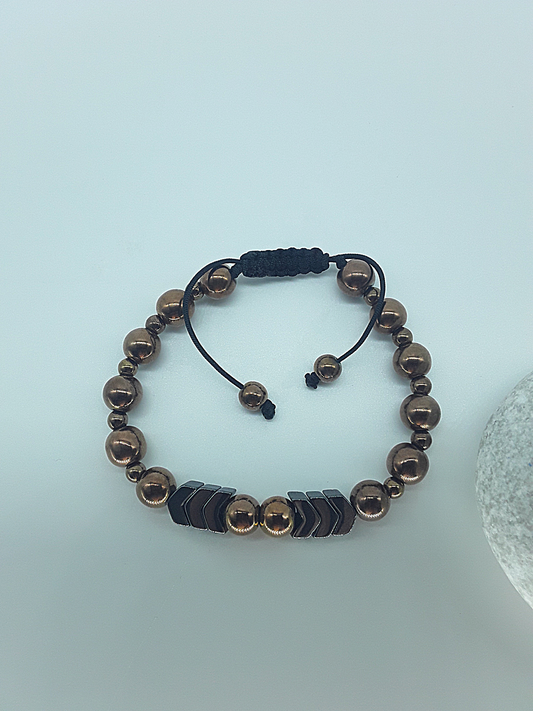 The Arrow of Equilibrium Bracelet by Polmadeva – black onyx and hematite bracelet with arrow accents symbolizing balance, focus, and quiet strength