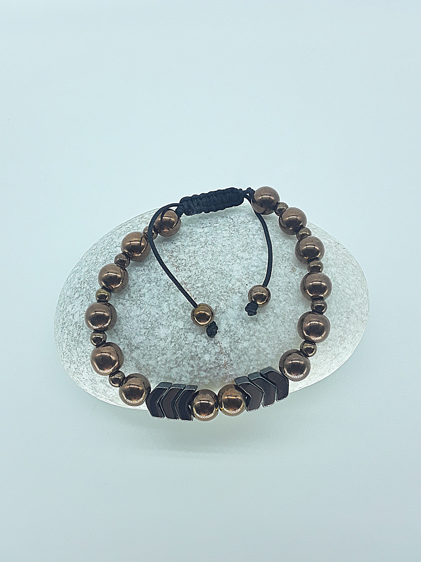 The Arrow of Equilibrium Bracelet by Polmadeva – black onyx and hematite bracelet with arrow accents symbolizing balance, focus, and quiet strength