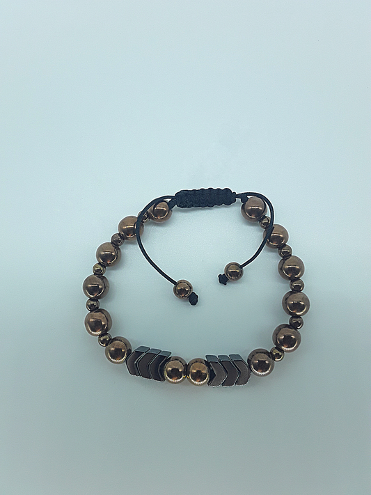 The Arrow of Equilibrium Bracelet by Polmadeva – black onyx and hematite bracelet with arrow accents symbolizing balance, focus, and quiet strength