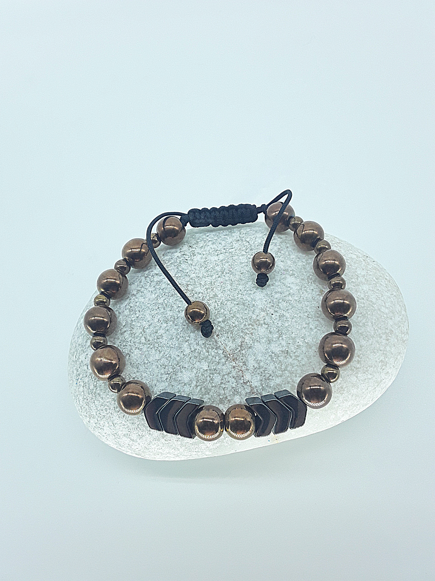 The Arrow of Equilibrium Bracelet by Polmadeva – black onyx and hematite bracelet with arrow accents symbolizing balance, focus, and quiet strength