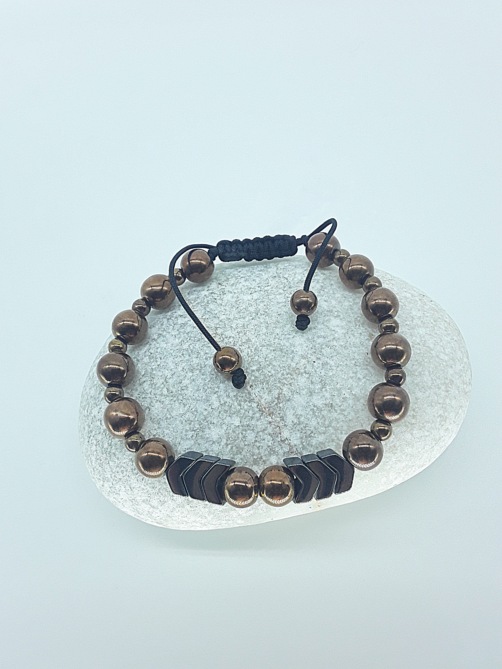 The Arrow of Equilibrium Bracelet by Polmadeva – black onyx and hematite bracelet with arrow accents symbolizing balance, focus, and quiet strength