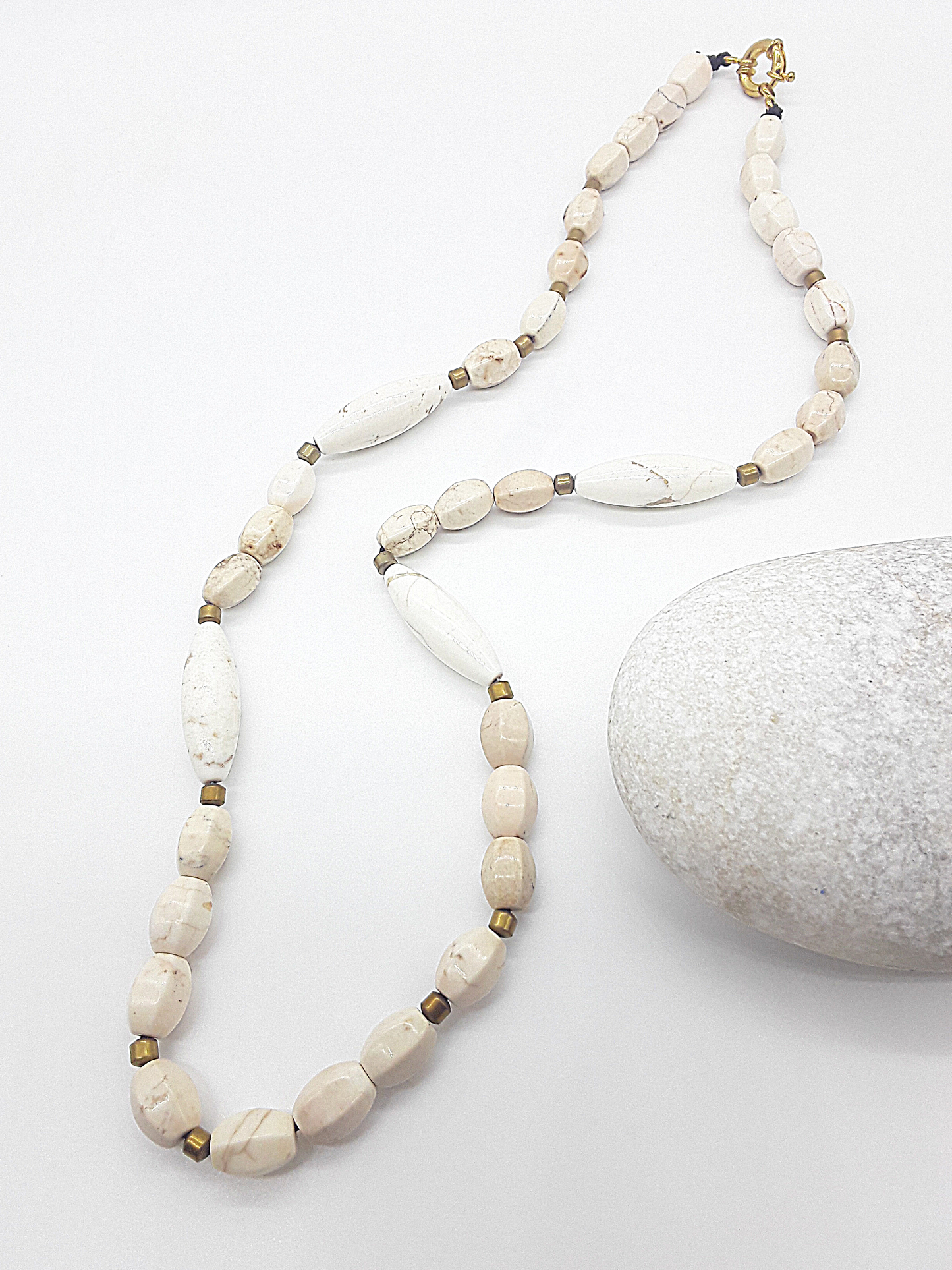 The Ivory Horizon Necklace by Polmadeva – Turquoise Ivory and Hematite necklace symbolizing simplicity, balance, and timeless strength.