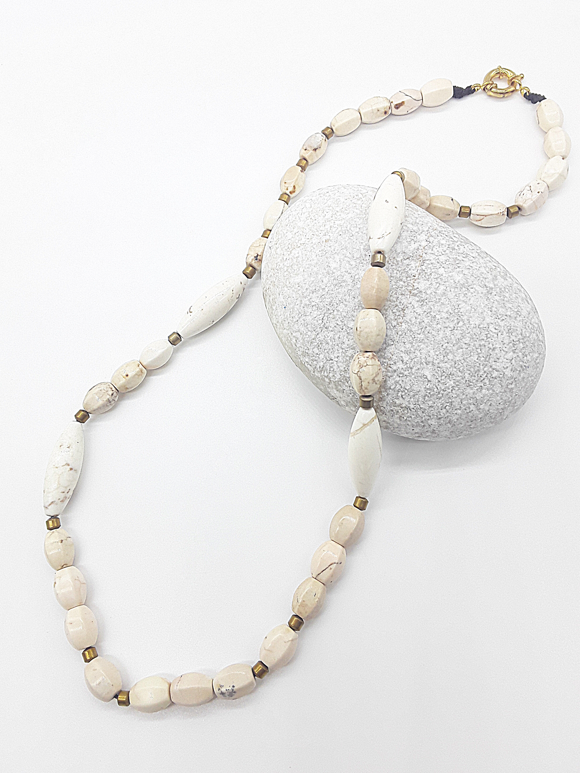 The Ivory Horizon Necklace by Polmadeva – Turquoise Ivory and Hematite necklace symbolizing simplicity, balance, and timeless strength.