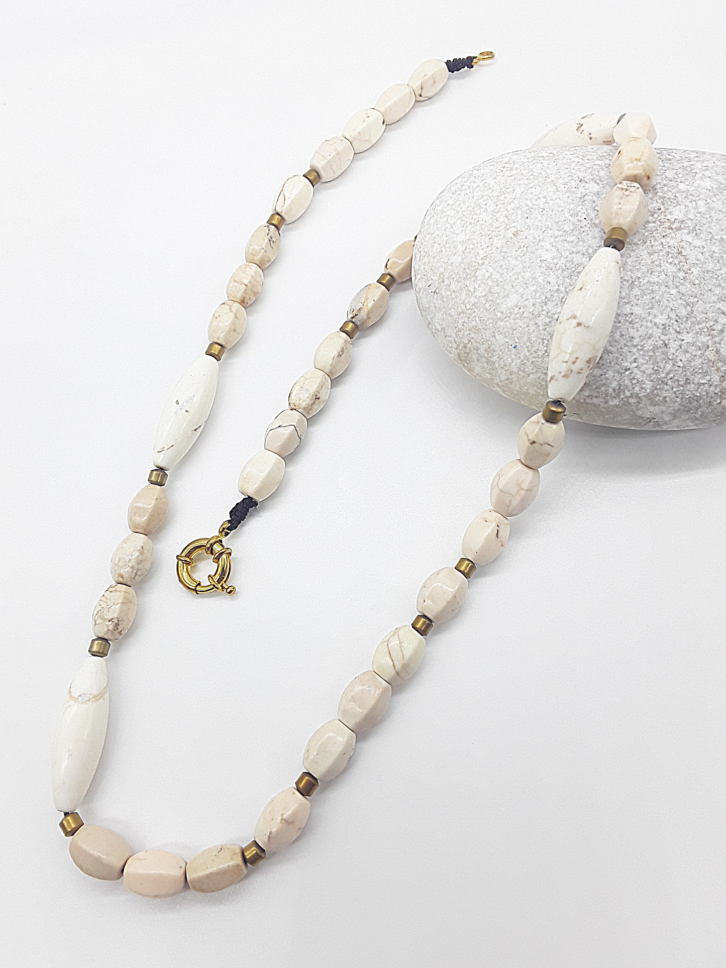 The Ivory Horizon Necklace by Polmadeva – Turquoise Ivory and Hematite necklace symbolizing simplicity, balance, and timeless strength.