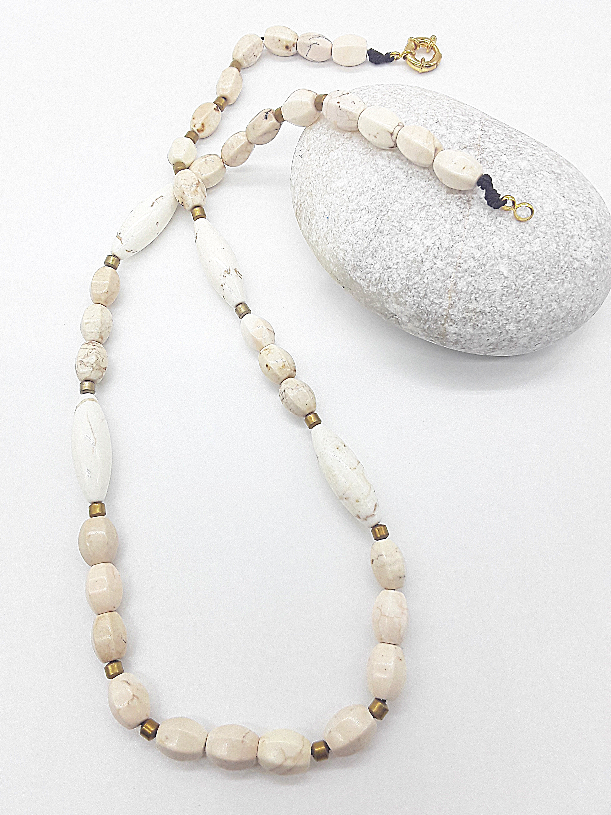 The Ivory Horizon Necklace by Polmadeva – Turquoise Ivory and Hematite necklace symbolizing simplicity, balance, and timeless strength.