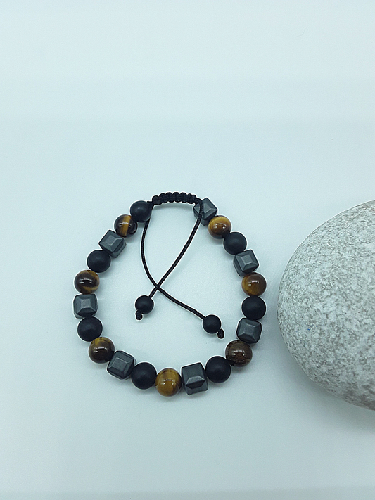The Resolute Bracelet by Polmadeva – black onyx, hematite and tiger eye bracelet symbolizing courage, balance, and quiet strength