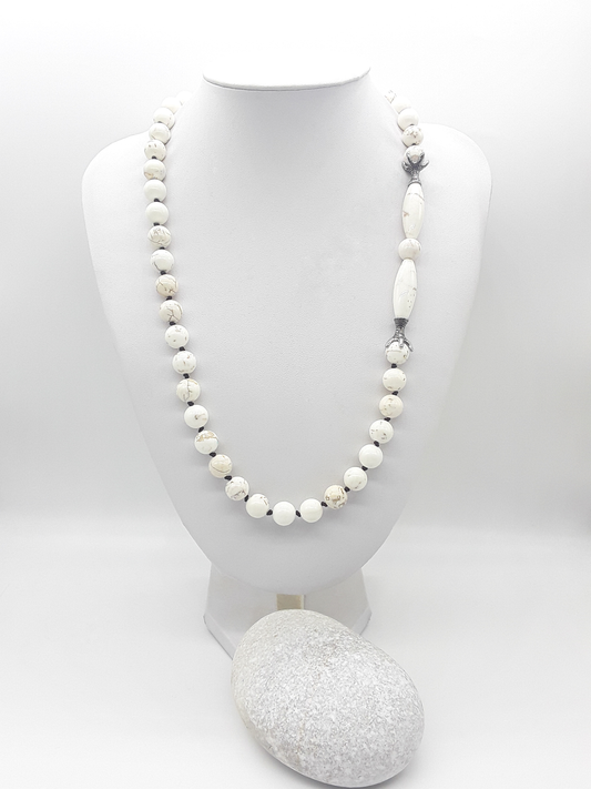 The Ivory Claw Necklace by Polmadeva – Turquoise Ivory gemstone necklace with silver claws, symbolizing protection, purity, and balance.