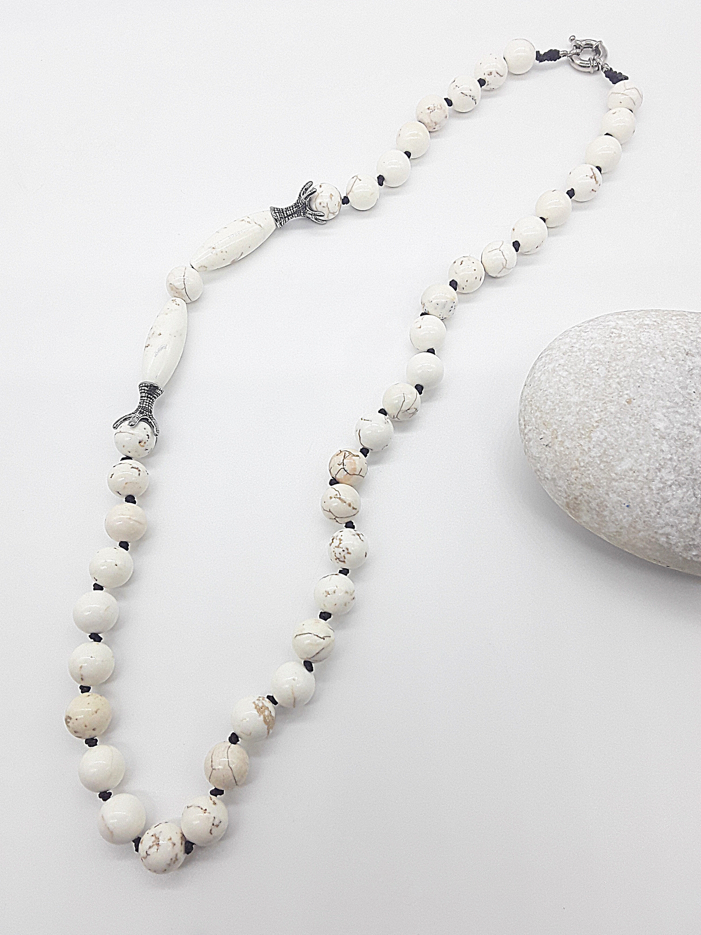 The Ivory Claw Necklace by Polmadeva – Turquoise Ivory gemstone necklace with silver claws, symbolizing protection, purity, and balance.