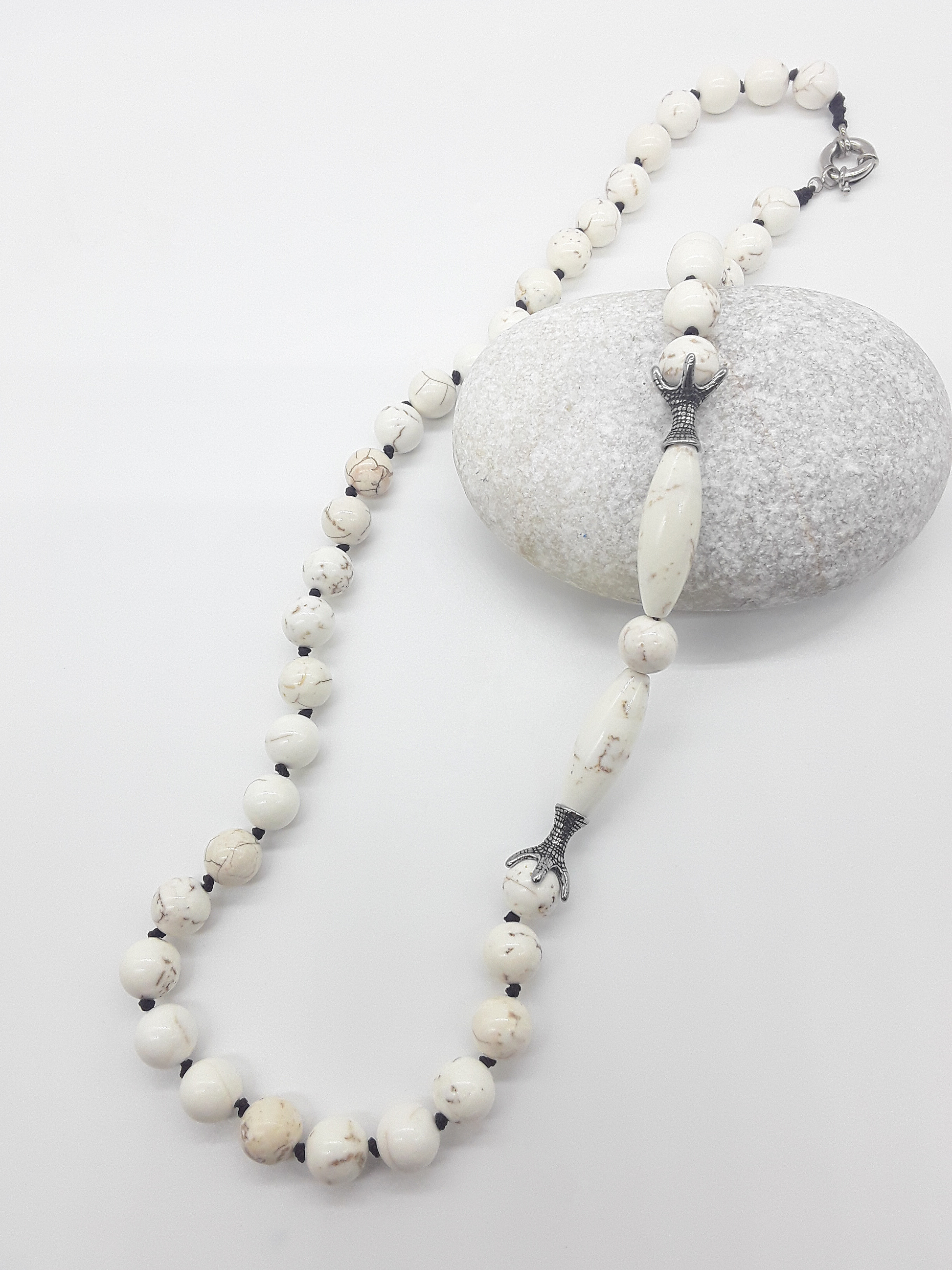 The Ivory Claw Necklace by Polmadeva – Turquoise Ivory gemstone necklace with silver claws, symbolizing protection, purity, and balance.