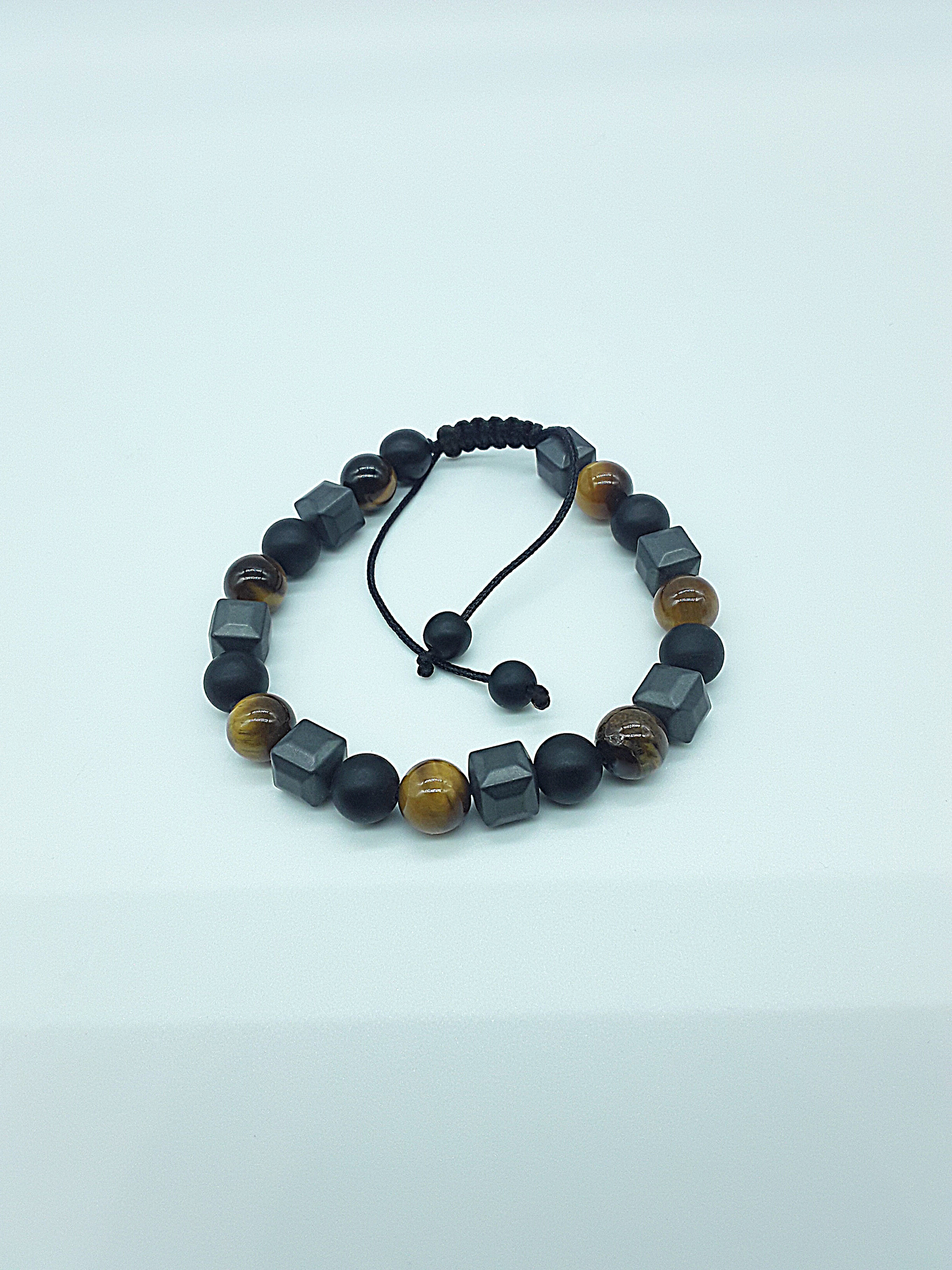 The Resolute Bracelet by Polmadeva – black onyx, hematite and tiger eye bracelet symbolizing courage, balance, and quiet strength