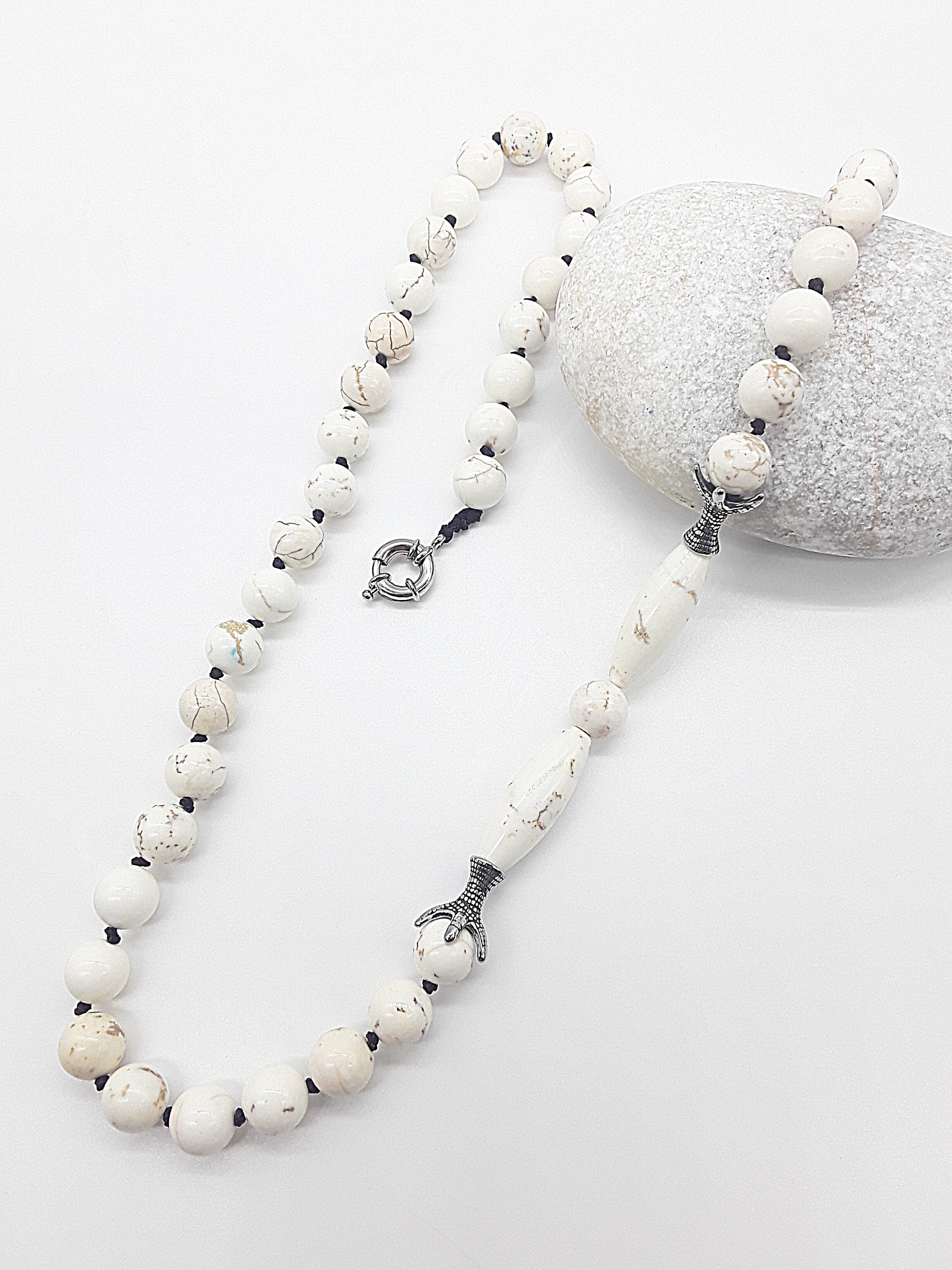 The Ivory Claw Necklace by Polmadeva – Turquoise Ivory gemstone necklace with silver claws, symbolizing protection, purity, and balance.