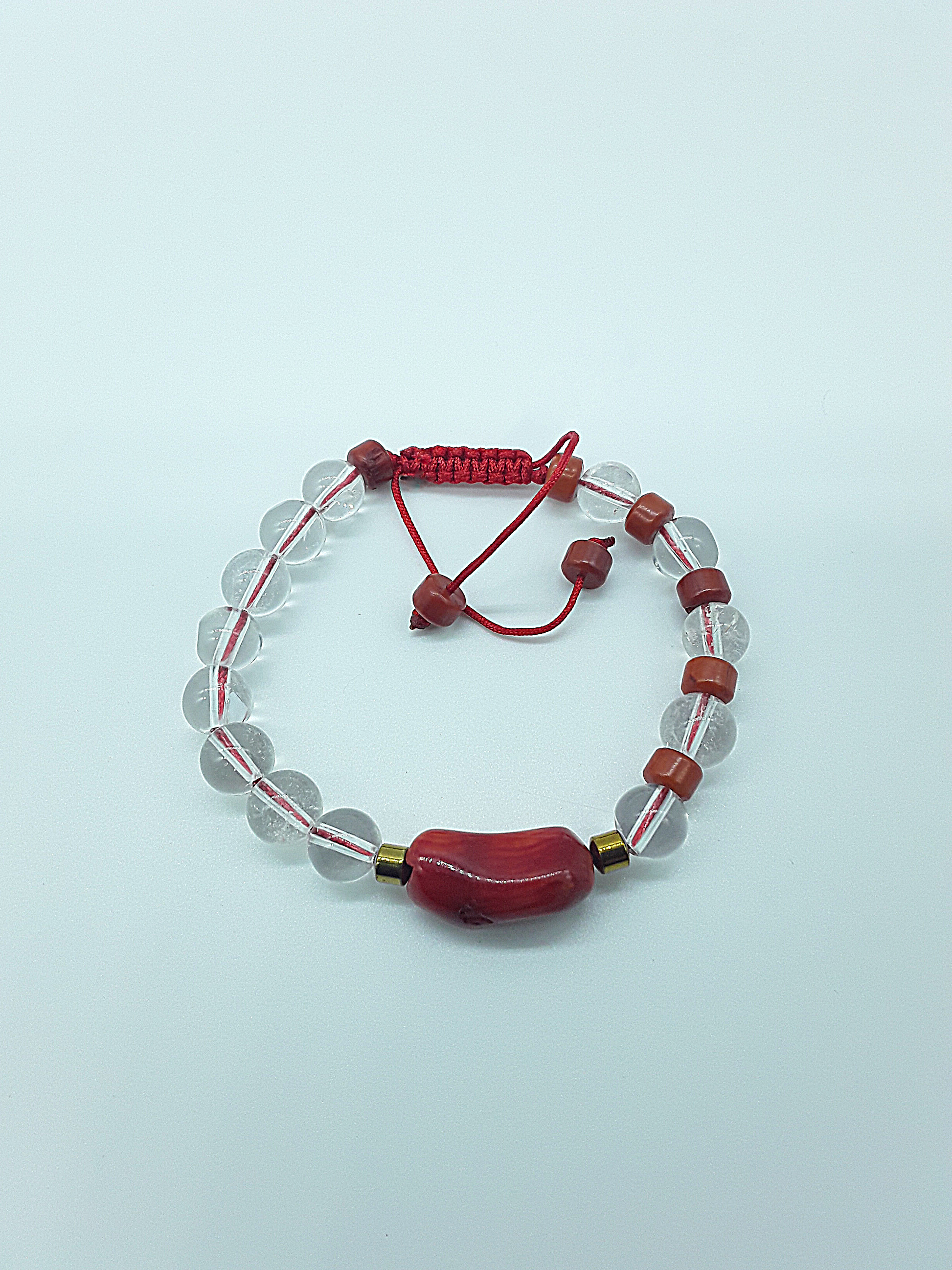 The Flameheart Bracelet by Polmadeva – red coral, quartz crystal and hematite bracelet symbolizing courage, strength, and determination