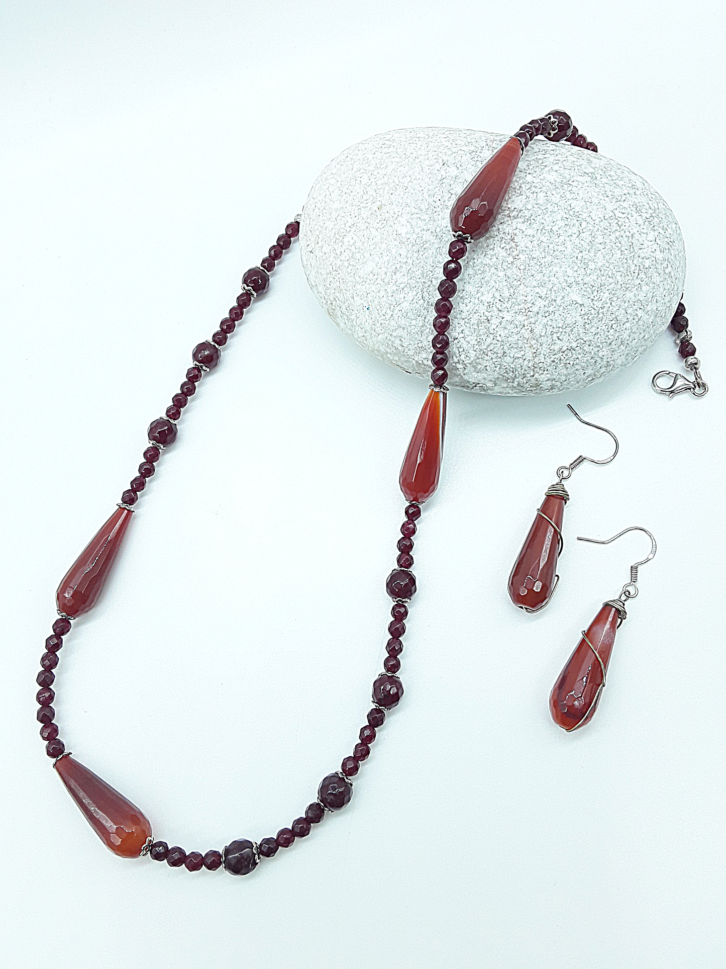 The Tears of Renewal agate necklace and earrings set by Polmadeva – crafted from red gemstones and silver