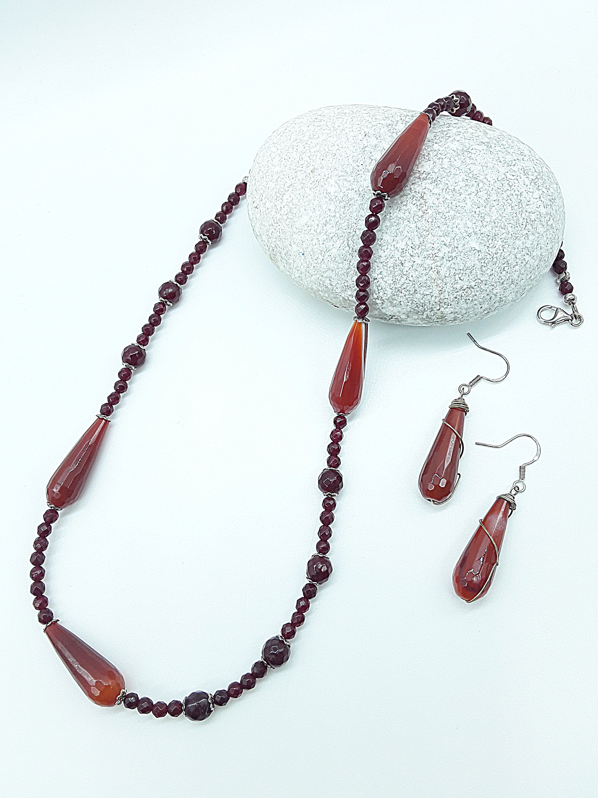 The Tears of Renewal agate necklace and earrings set by Polmadeva – crafted from red gemstones and silver