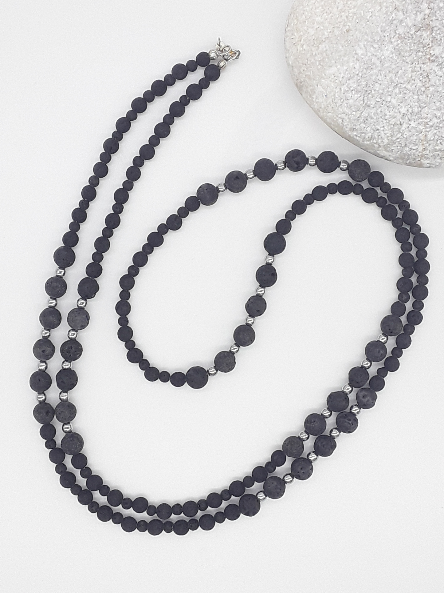 The Nocturne Strand Necklace by Polmadeva – lava stone, hematite and 925 silver necklace symbolizing quiet strength, elegance, and resilience