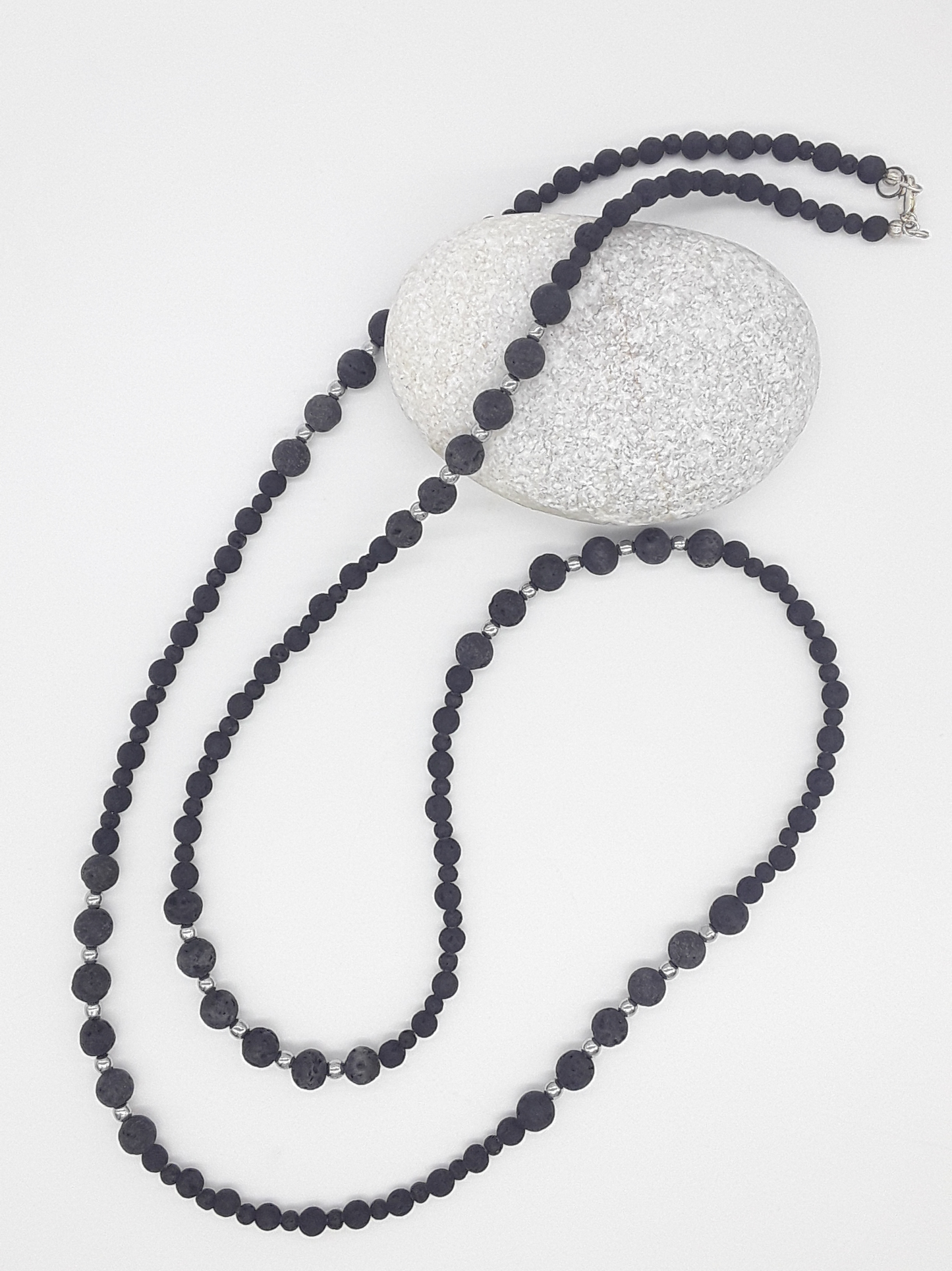 The Nocturne Strand Necklace by Polmadeva – lava stone, hematite and 925 silver necklace symbolizing quiet strength, elegance, and resilience
