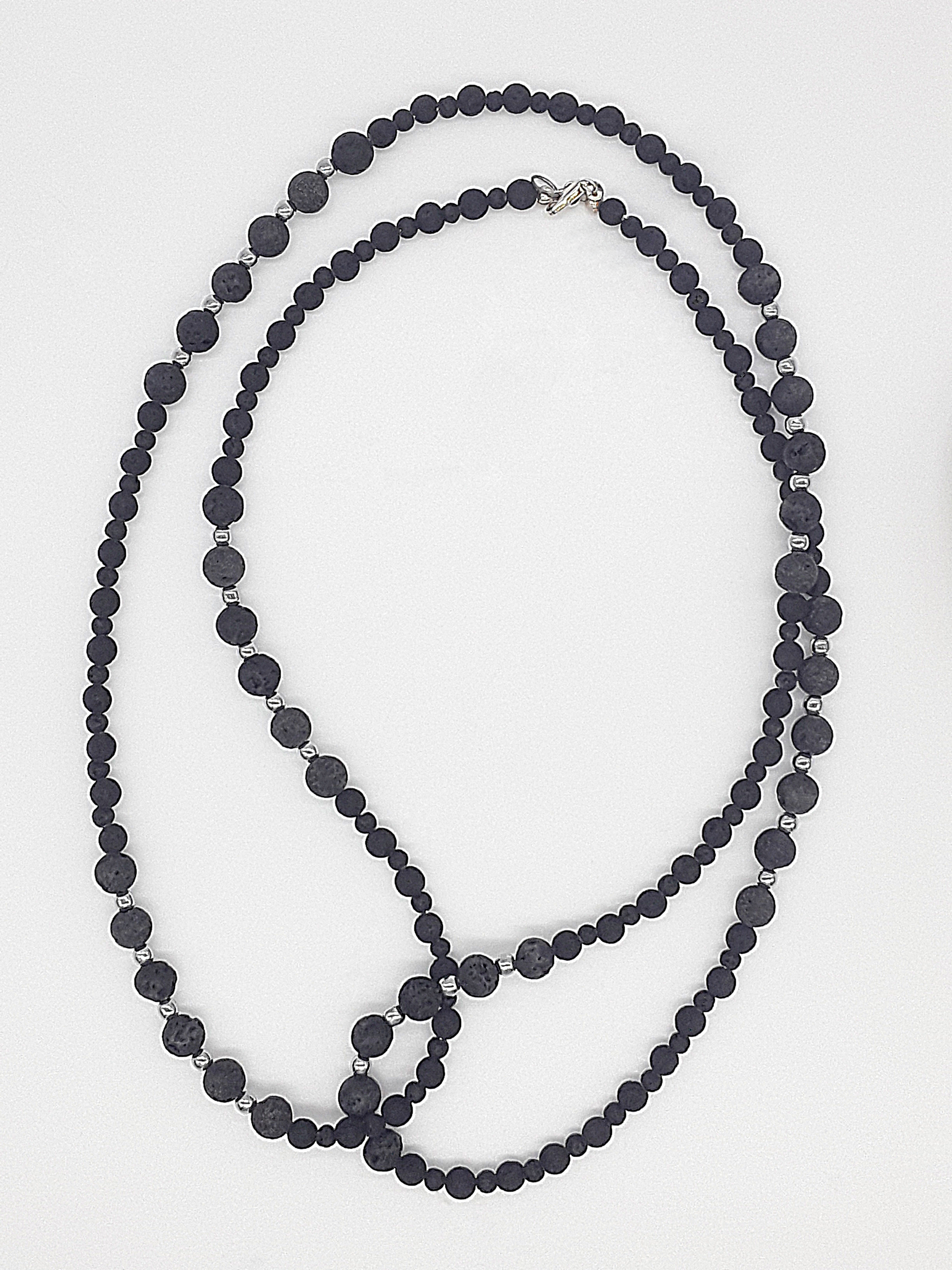 The Nocturne Strand Necklace by Polmadeva – lava stone, hematite and 925 silver necklace symbolizing quiet strength, elegance, and resilience