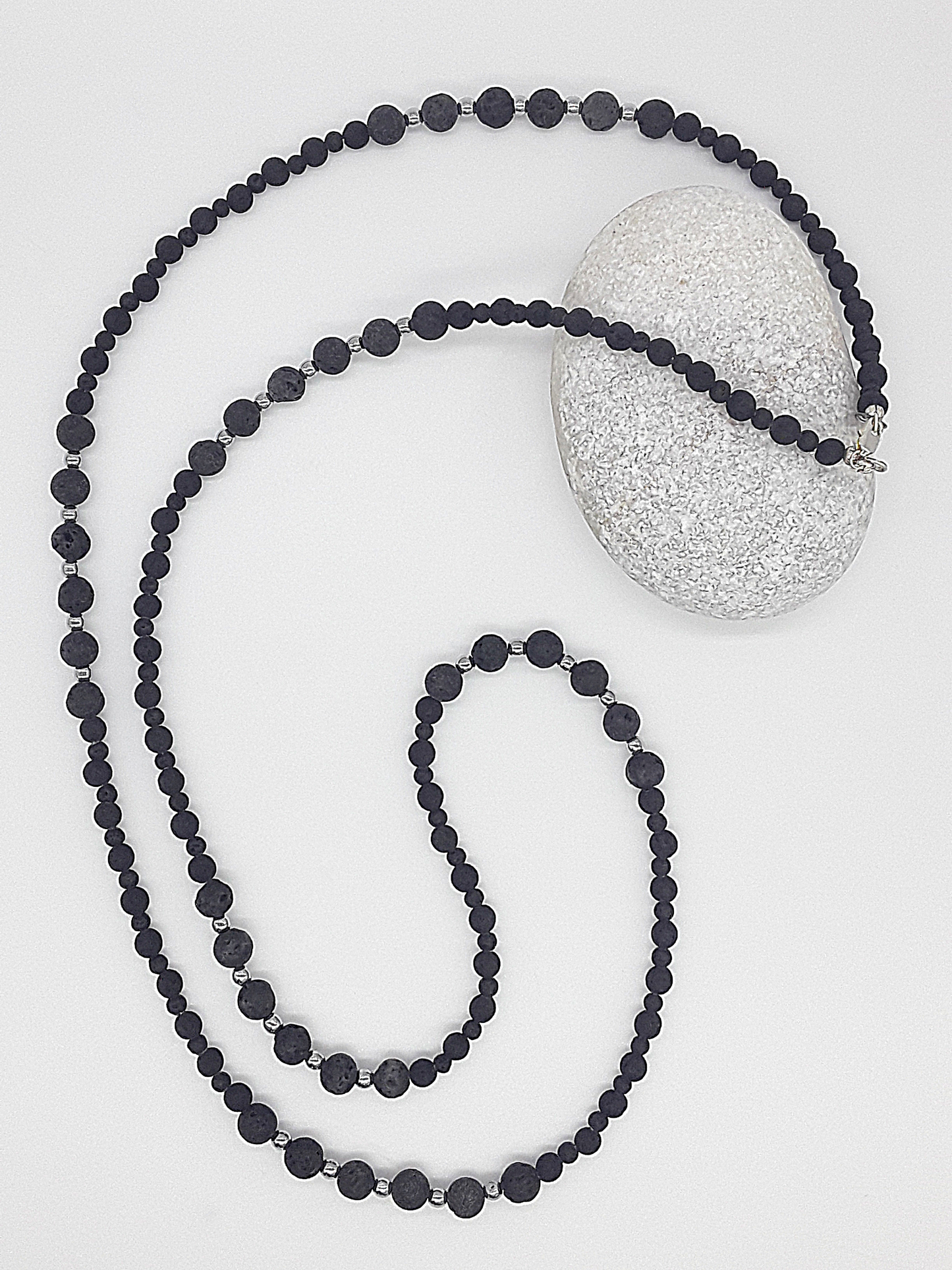 The Nocturne Strand Necklace by Polmadeva – lava stone, hematite and 925 silver necklace symbolizing quiet strength, elegance, and resilience