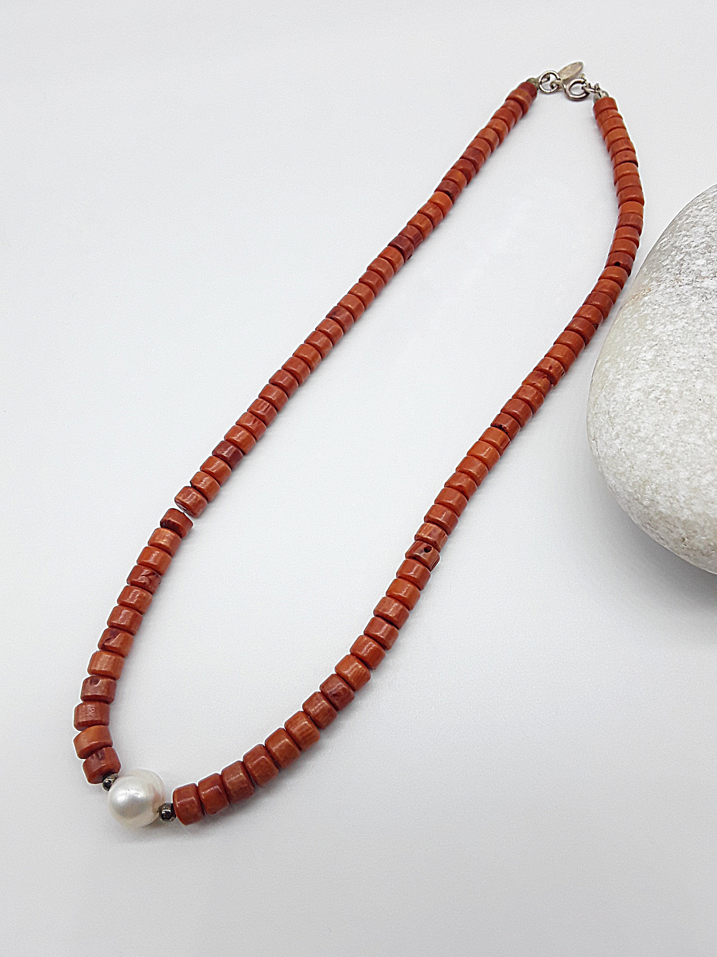 The Coral Flame Necklace by Polmadeva – red coral and freshwater pearl necklace with 925 silver symbolizing courage, elegance, and resilience