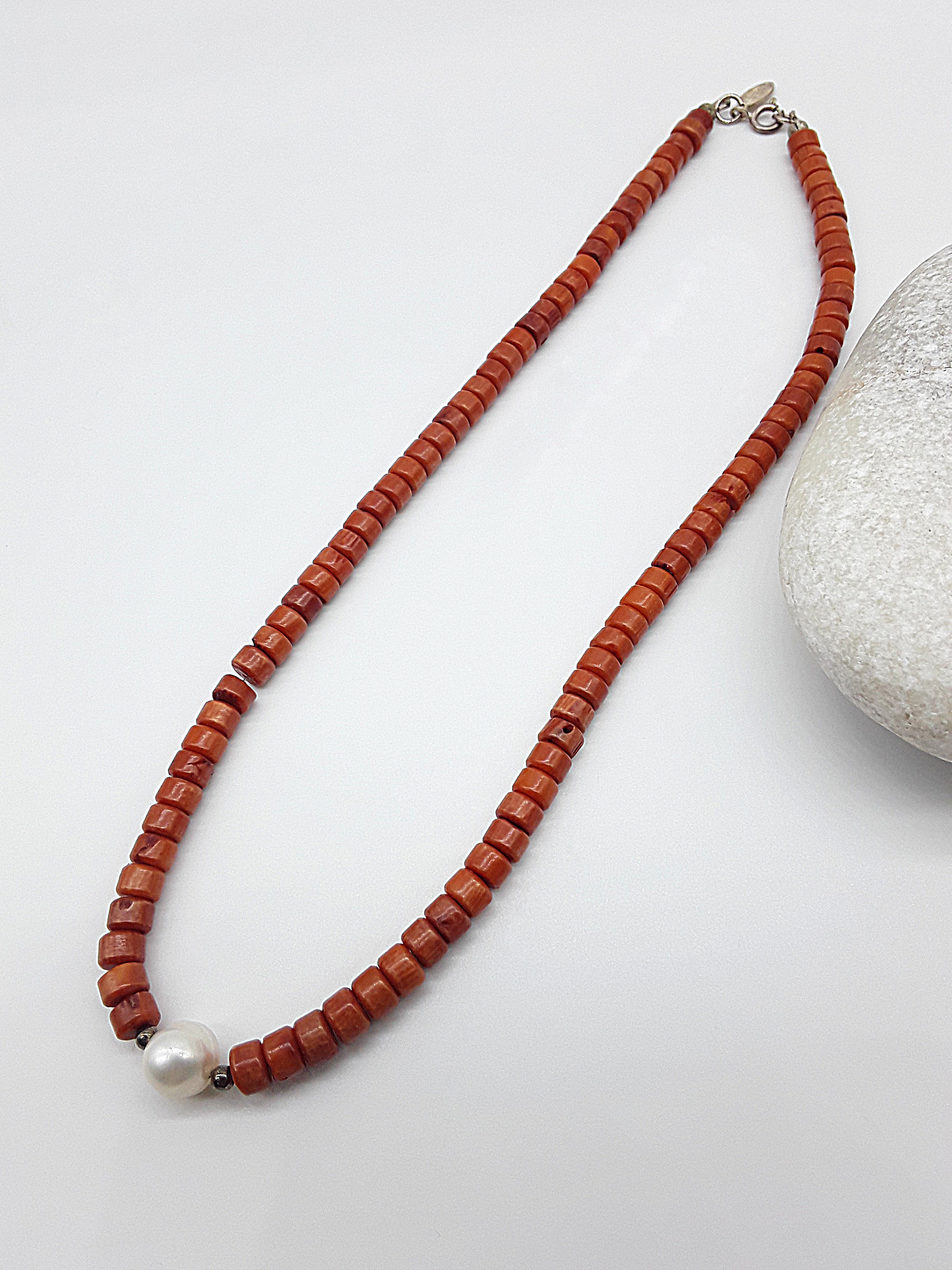 The Coral Flame Necklace by Polmadeva – red coral and freshwater pearl necklace with 925 silver symbolizing courage, elegance, and resilience