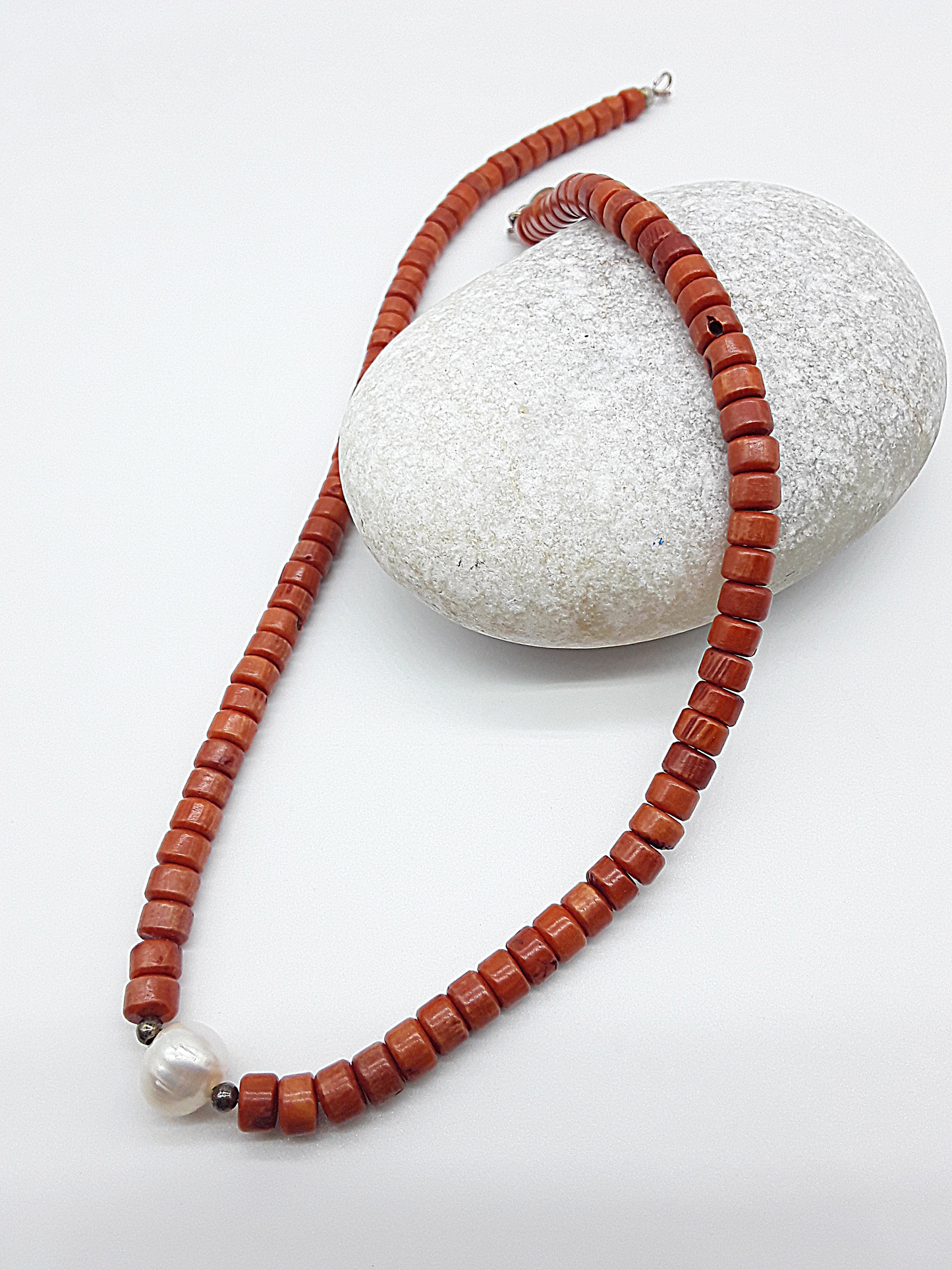The Coral Flame Necklace by Polmadeva – red coral and freshwater pearl necklace with 925 silver symbolizing courage, elegance, and resilience