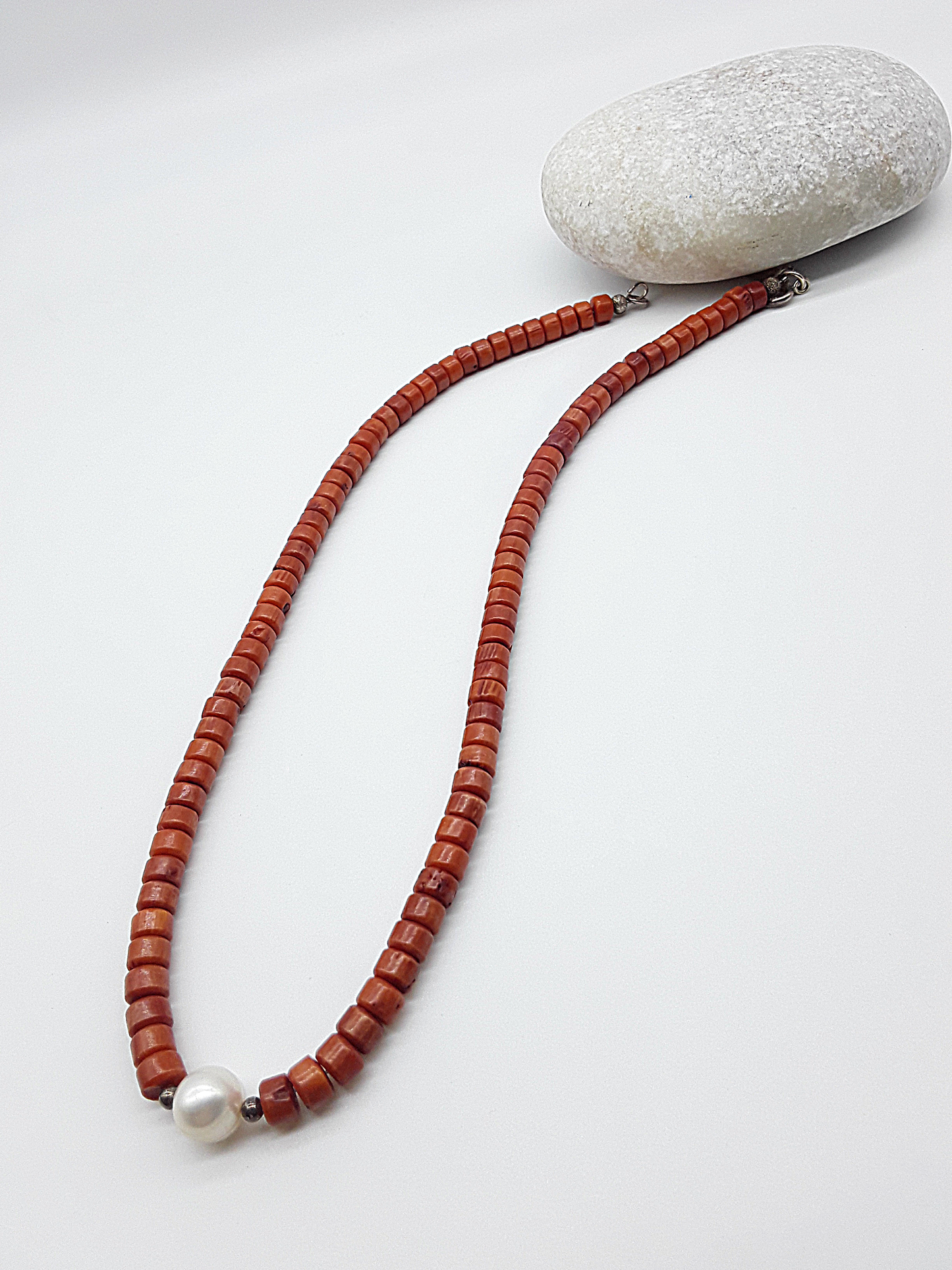 The Coral Flame Necklace by Polmadeva – red coral and freshwater pearl necklace with 925 silver symbolizing courage, elegance, and resilience