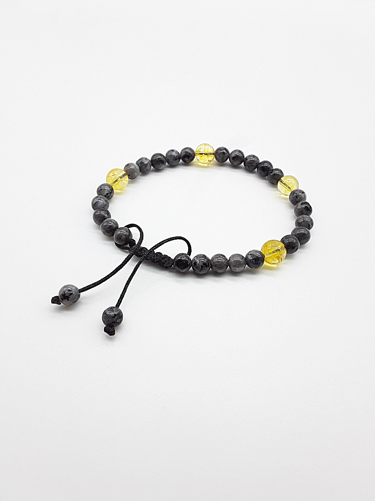 The Solar Veil Bracelet by Polmadeva – Labradorite and Citrine Crystal bracelet symbolizing balance, light, and transformation.