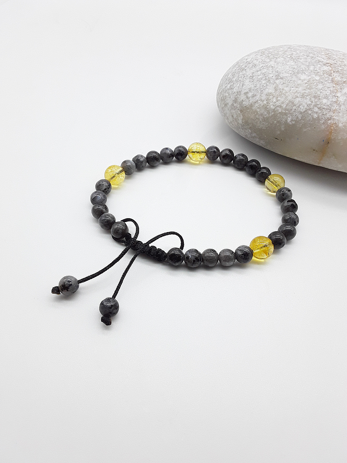 The Solar Veil Bracelet by Polmadeva – Labradorite and Citrine Crystal bracelet symbolizing balance, light, and transformation.