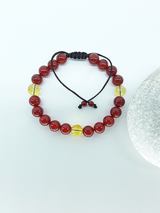 The Flame of Grace Bracelet by Polmadeva – citrine and carnelian bracelet symbolizing courage, vitality, and graceful strength