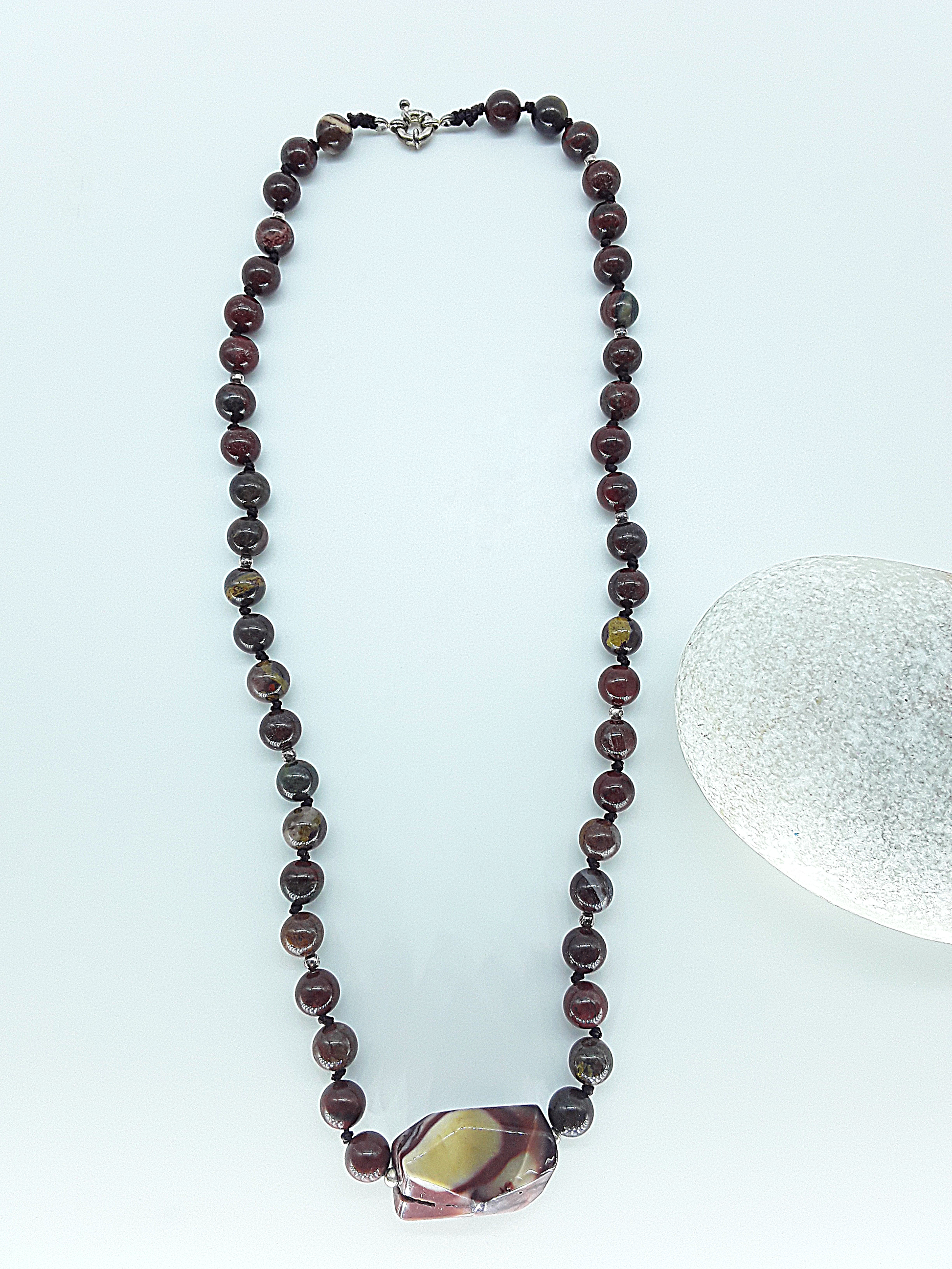 The Iron Flame Necklace by Polmadeva – Red Tiger Iron & Agate necklace symbolizing strength, resilience, and balance born in fire.