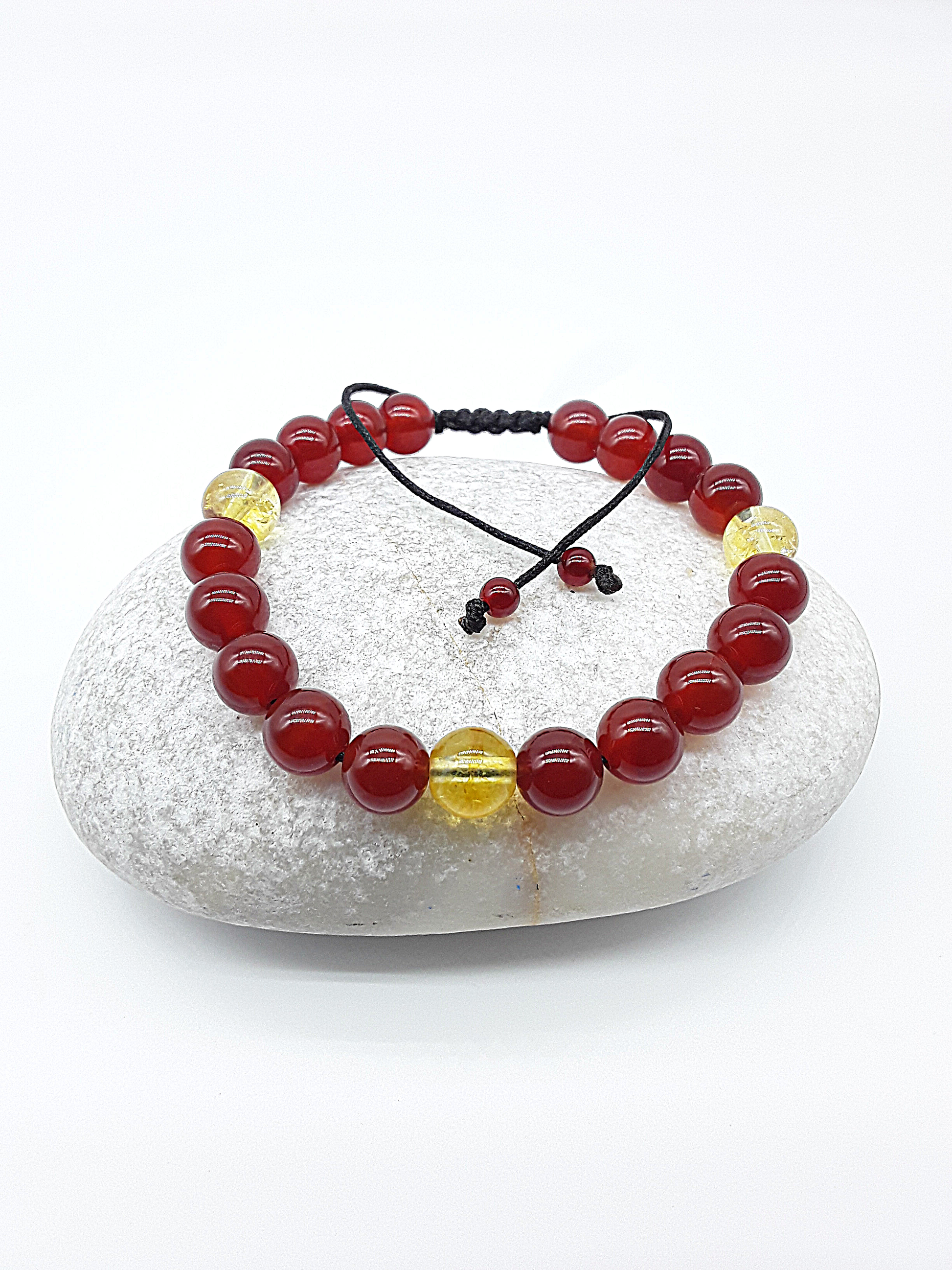 The Flame of Grace Bracelet by Polmadeva – citrine and carnelian bracelet symbolizing courage, vitality, and graceful strength