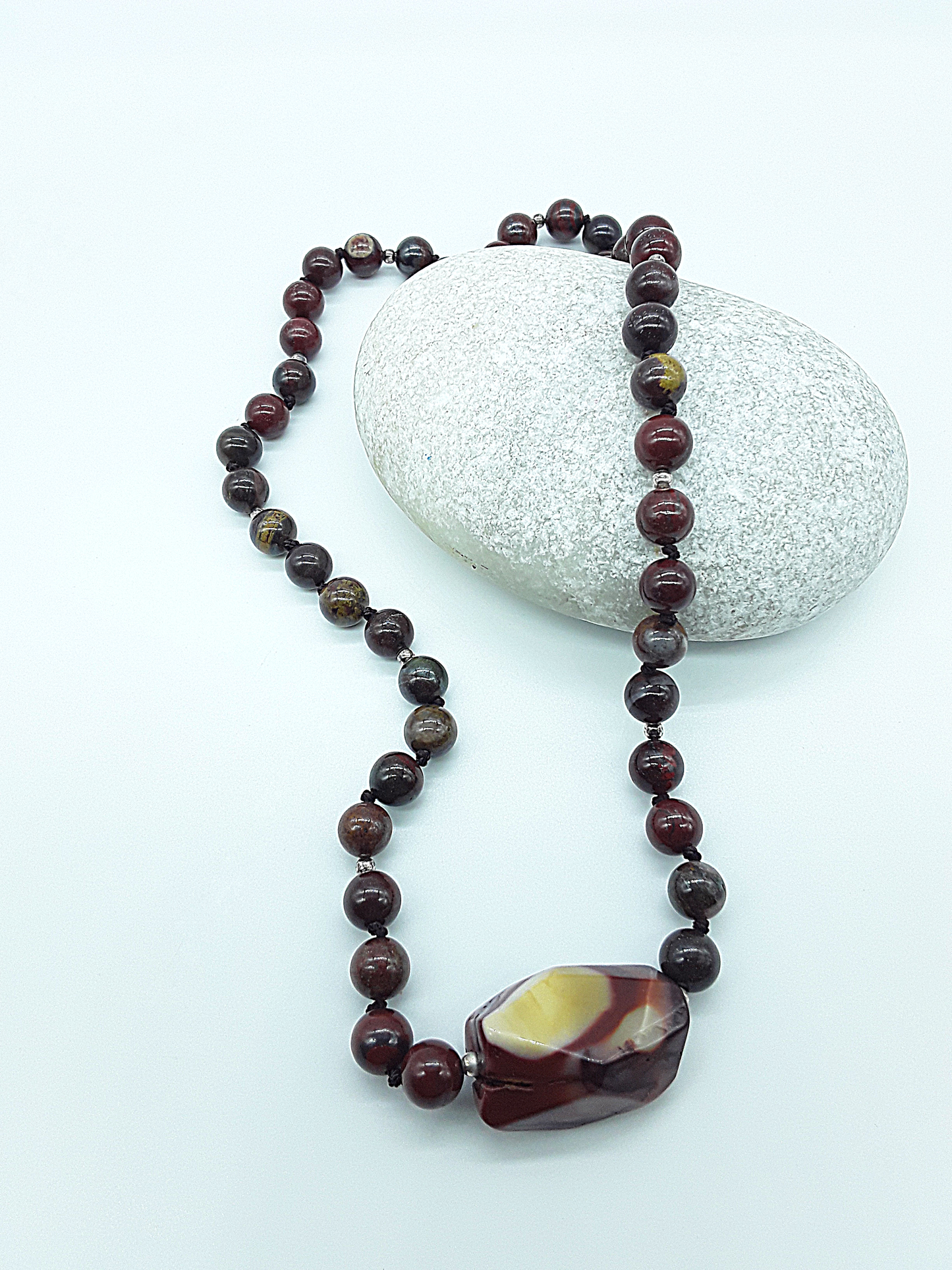 The Iron Flame Necklace by Polmadeva – Red Tiger Iron & Agate necklace symbolizing strength, resilience, and balance born in fire.