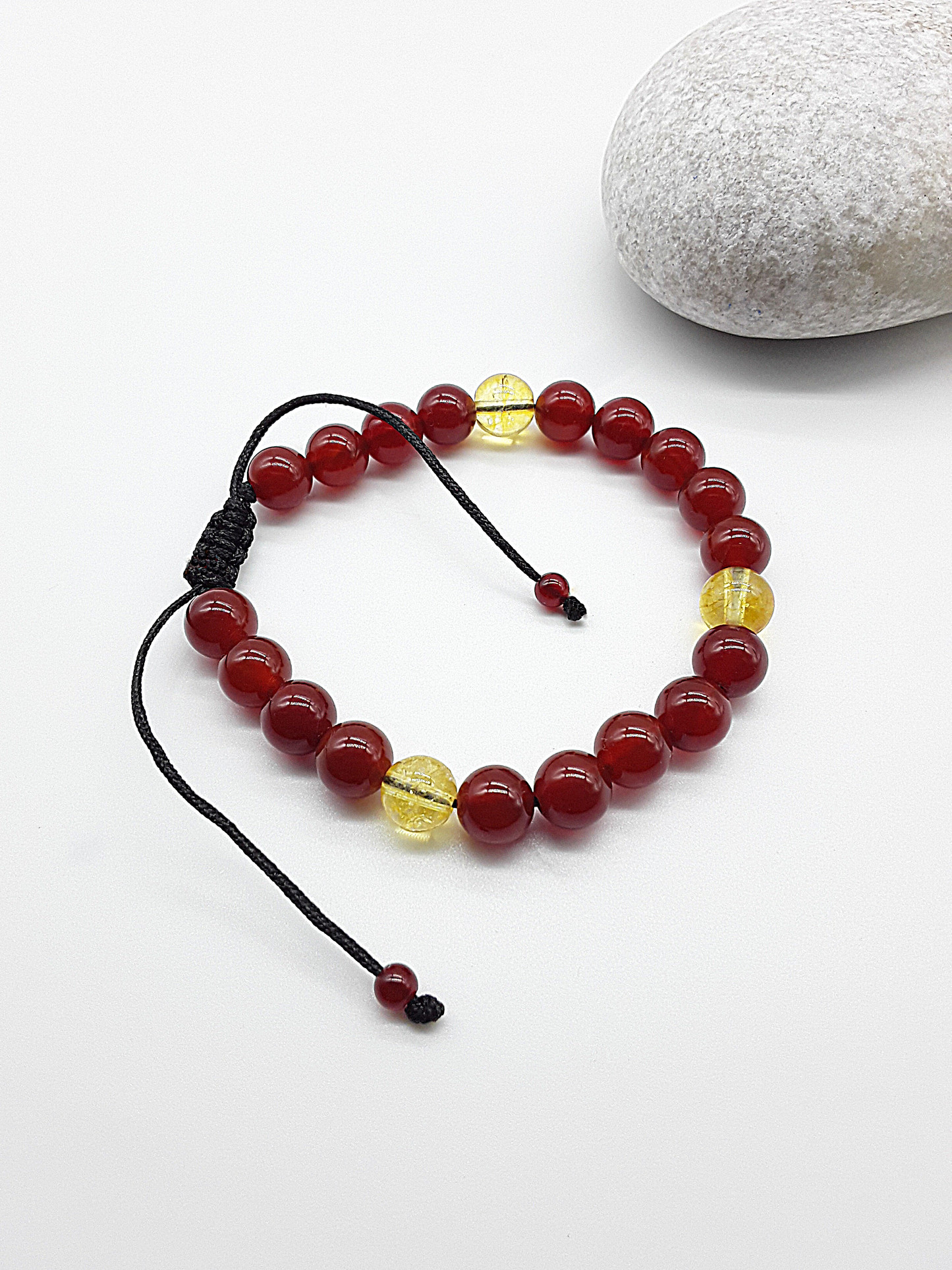 The Flame of Grace Bracelet by Polmadeva – citrine and carnelian bracelet symbolizing courage, vitality, and graceful strength