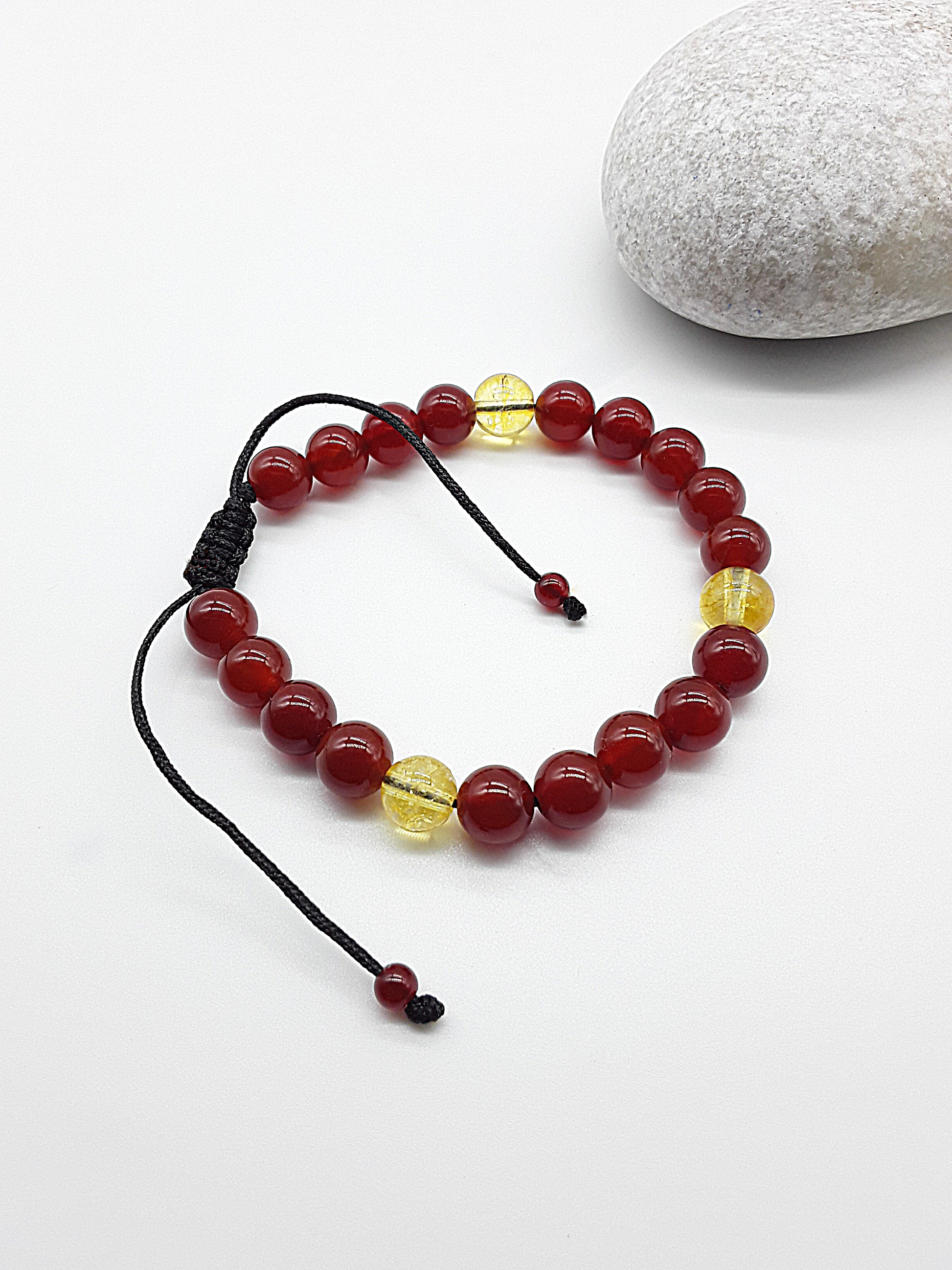 The Flame of Grace Bracelet by Polmadeva – citrine and carnelian bracelet symbolizing courage, vitality, and graceful strength
