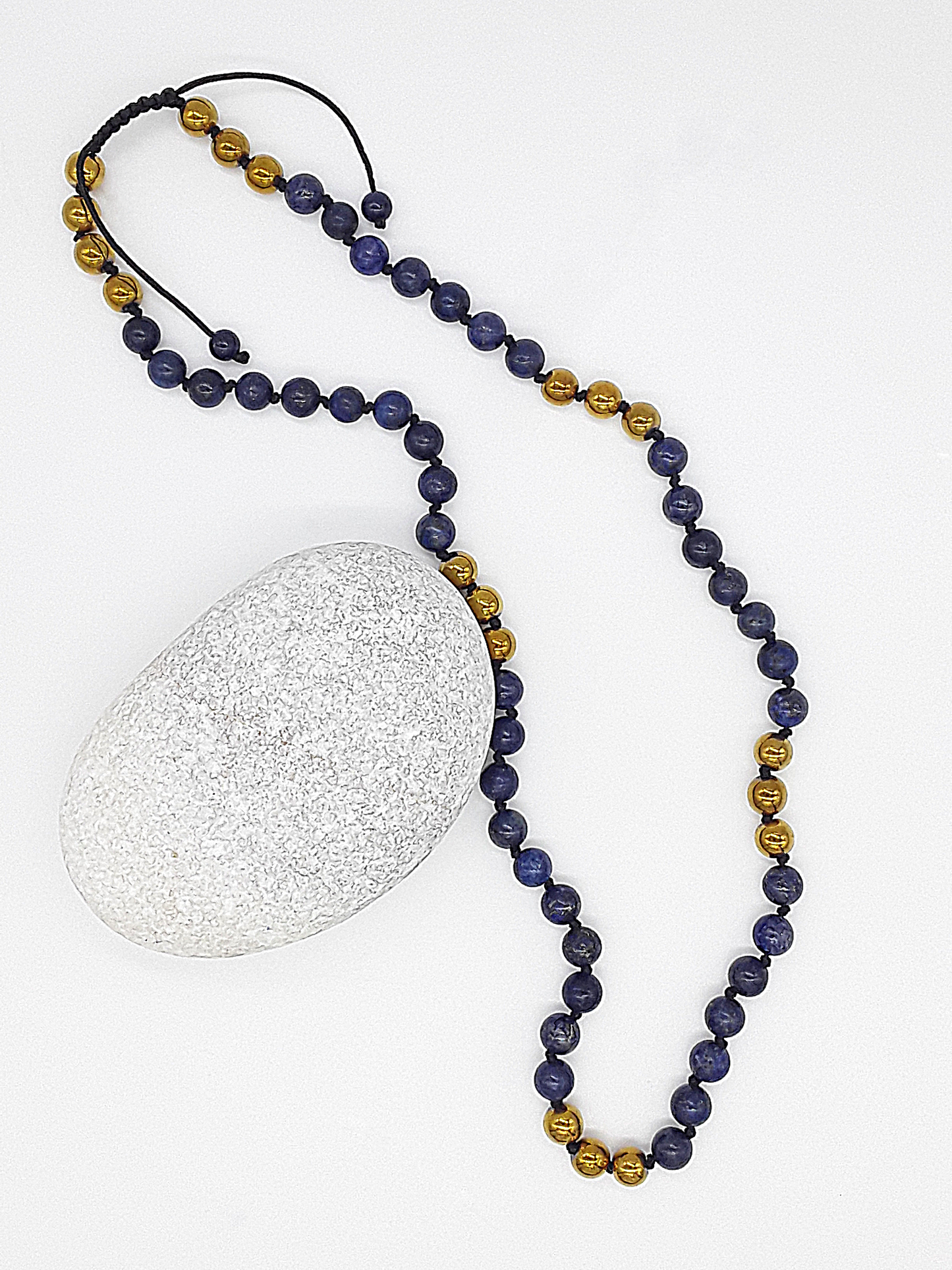 The Sacred Knots Necklace by Polmadeva – handcrafted Lapis Lazuli & Hematite necklace (8 mm), adjustable 60–80 cm. A talisman of vision, clarity & devotion.