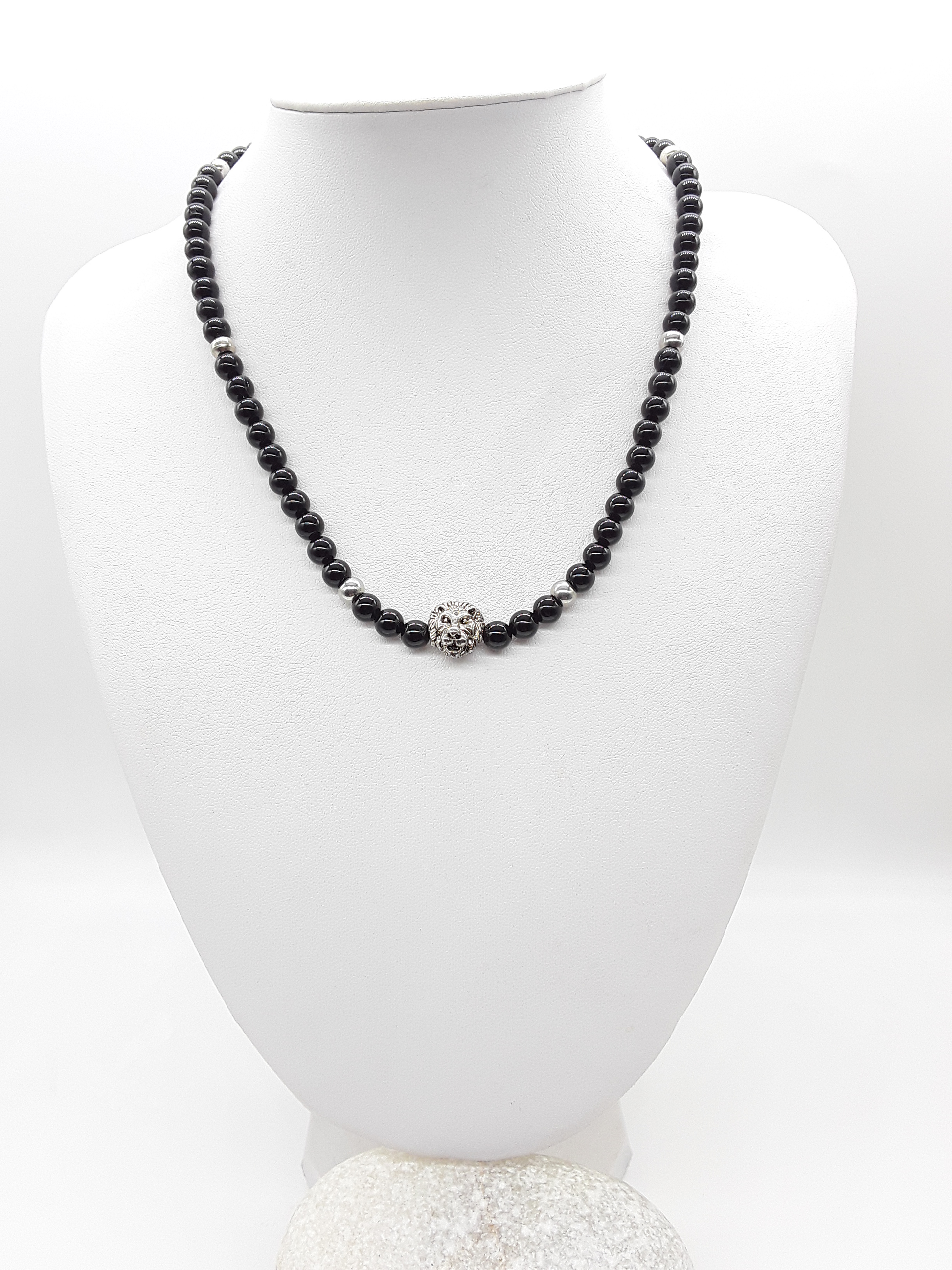 The Lionheart Guardian Necklace by Polmadeva – black onyx, 925 silver and stainless steel necklace with lion pendant symbolizing strength and protection