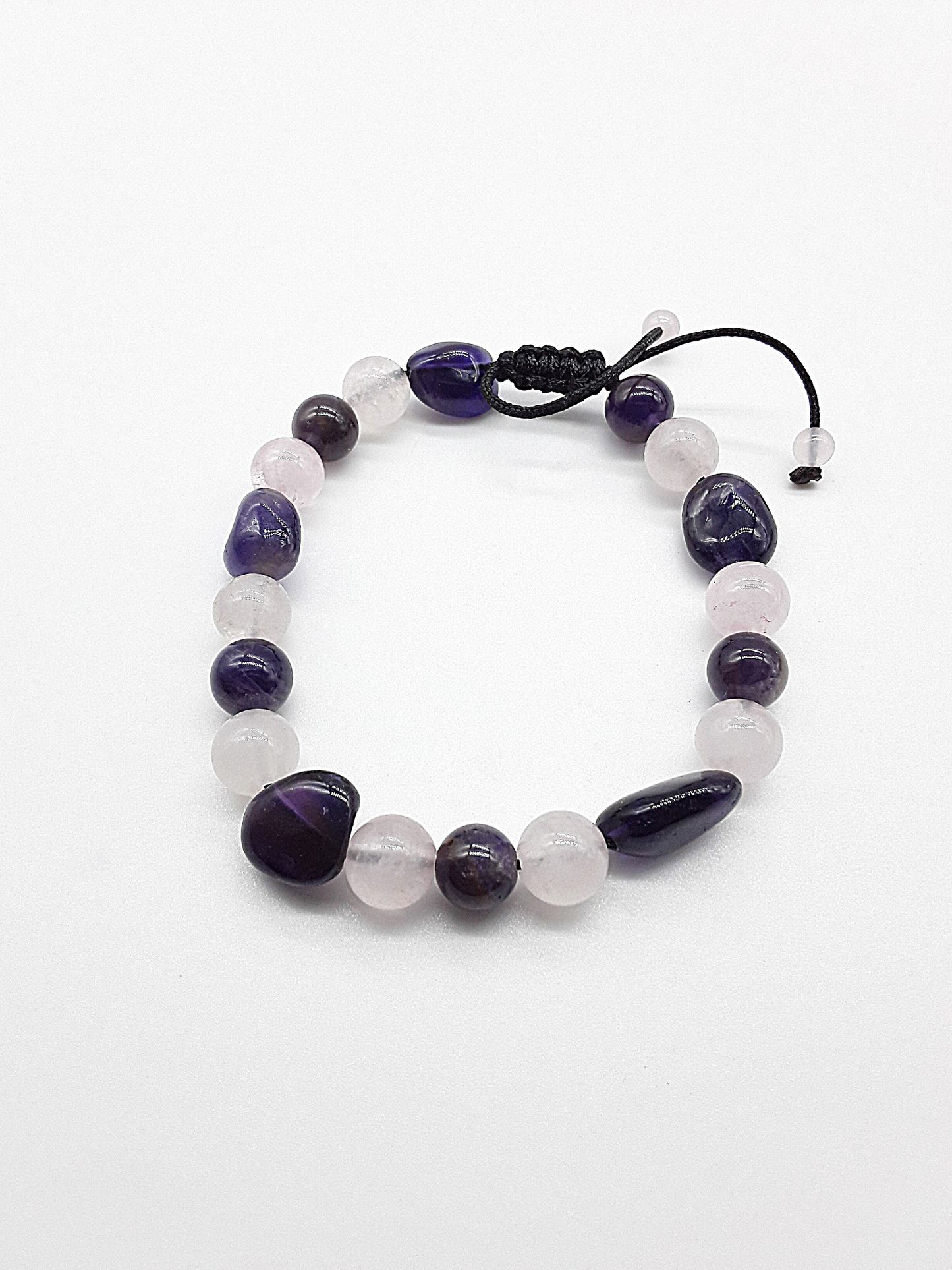 The Celestial Harmony Bracelet by Polmadeva – Amethyst and Quartz Crystal bracelet symbolizing intuition, clarity, and celestial balance.