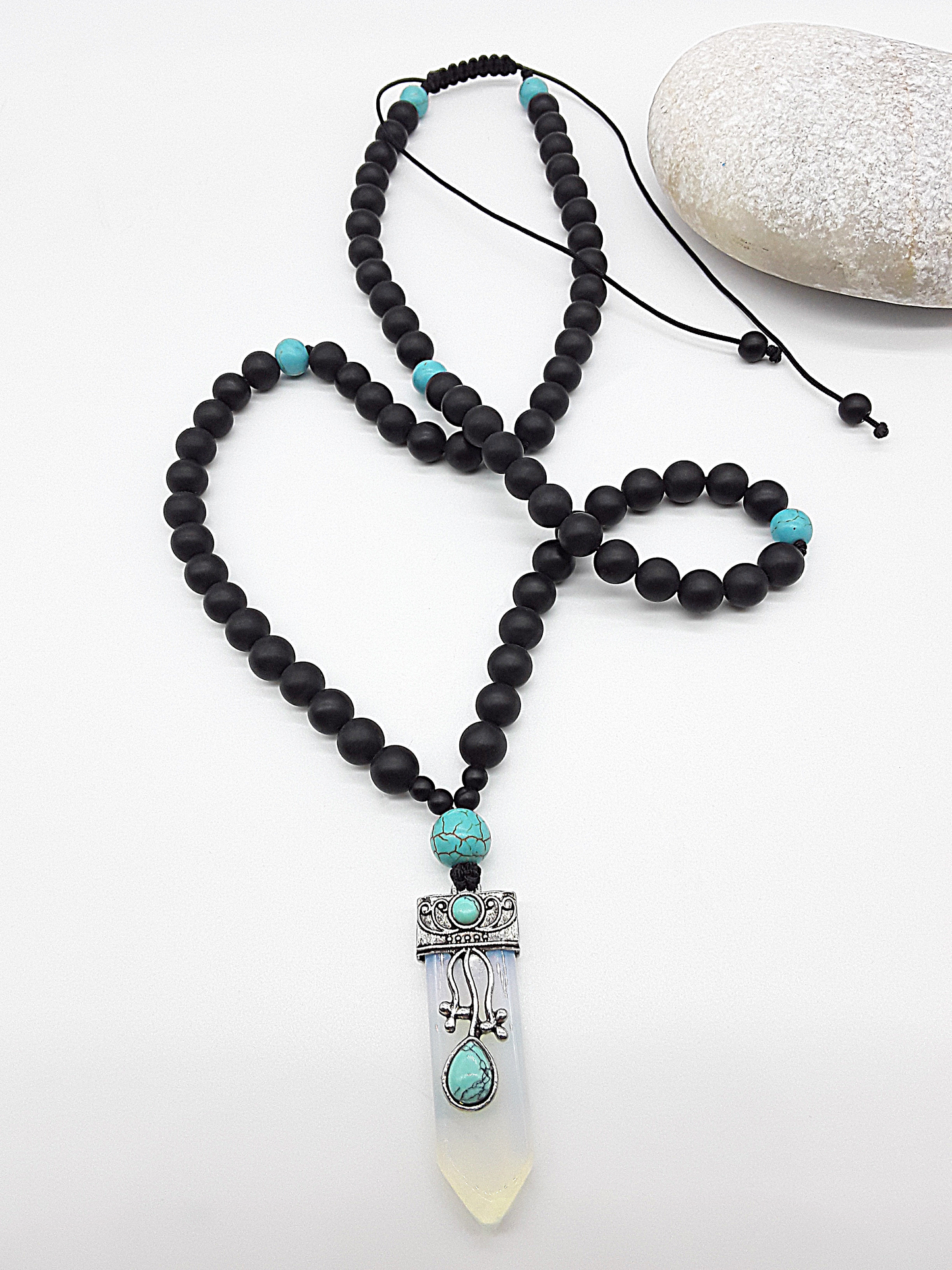 The Horizon Opalite Necklace by Polmadeva – black onyx and turquoise necklace with antique silver opalite pendant symbolizing transformation and renewal