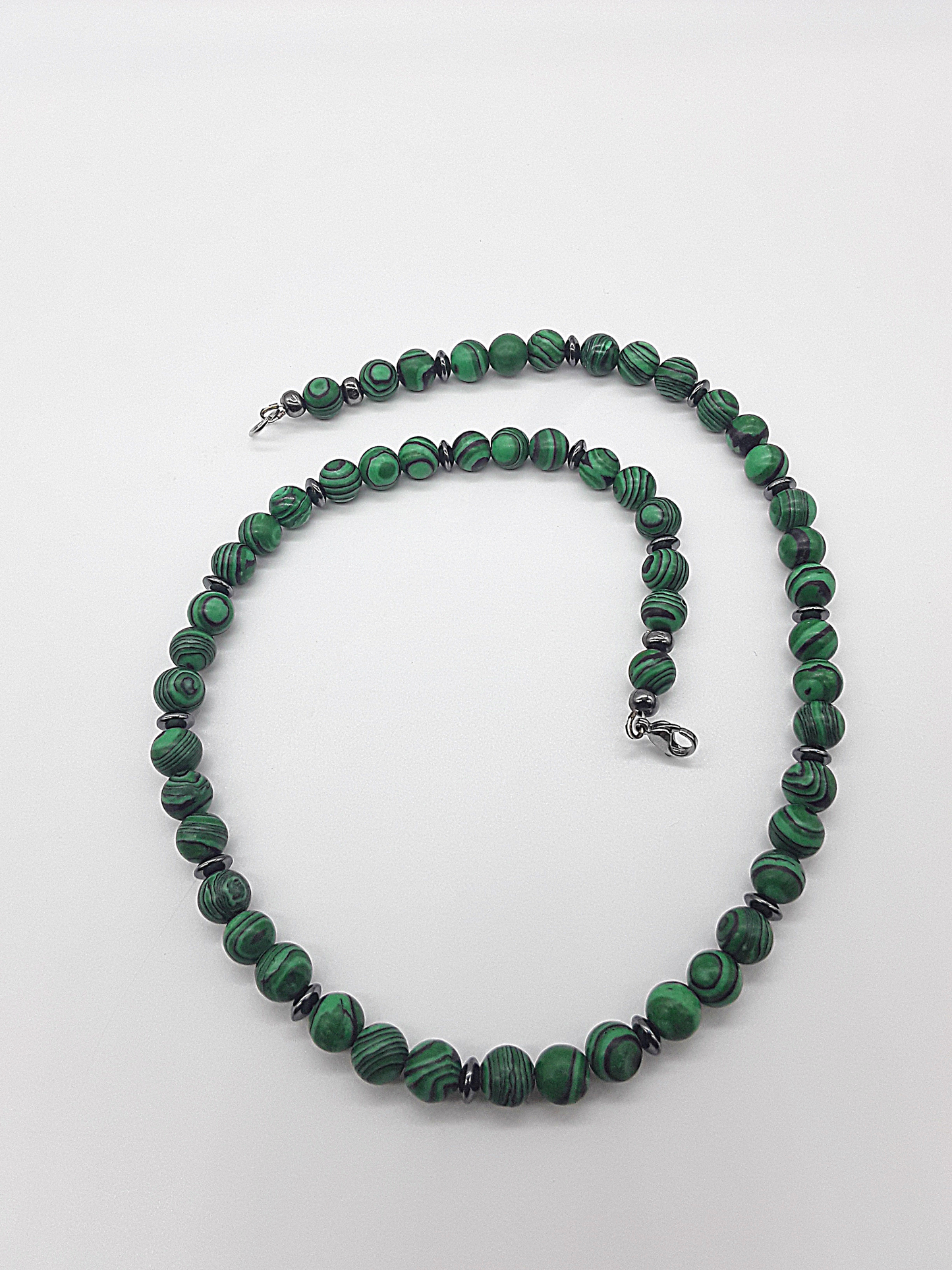 The Verdant Resolve Necklace by Polmadeva – malachite and hematite necklace symbolizing courage, grounding, and natural strength