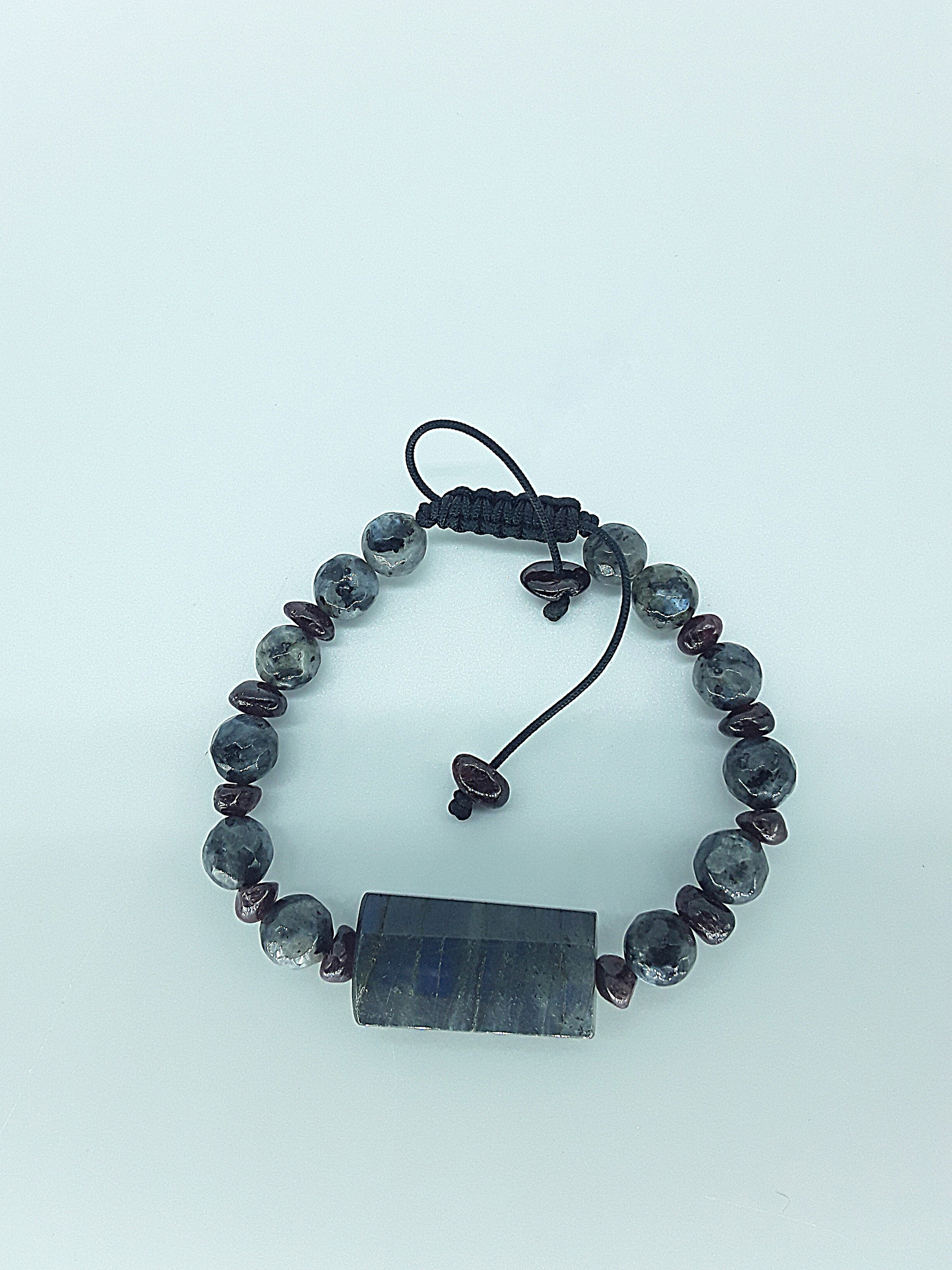 The Dawnstone Bracelet by Polmadeva – labradorite and garnet adjustable bracelet symbolizing renewal and inner strength