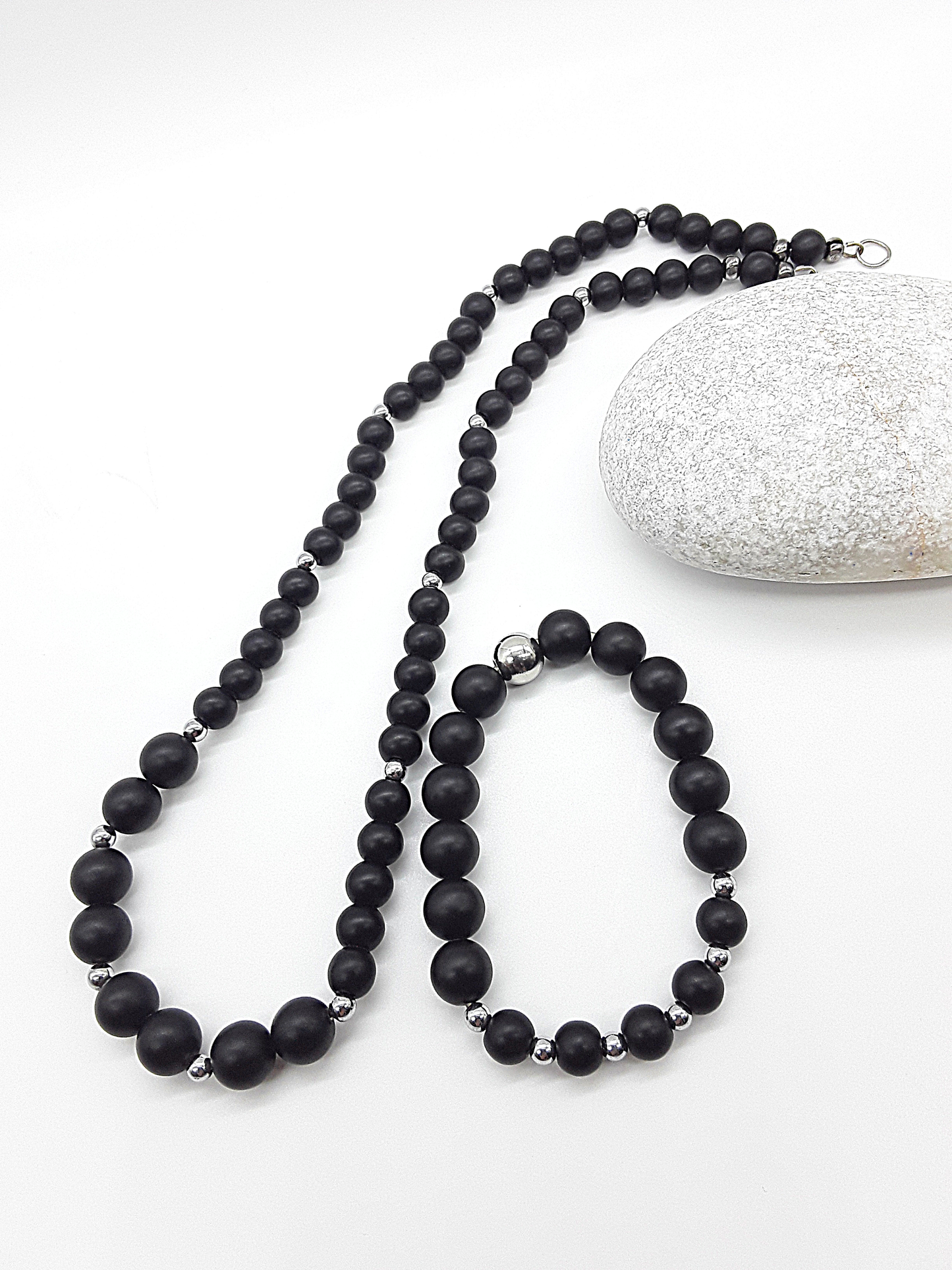 The Shadowguard Set by Polmadeva – matte black onyx and polished hematite necklace and bracelet symbolizing balance, strength, and timeless elegance