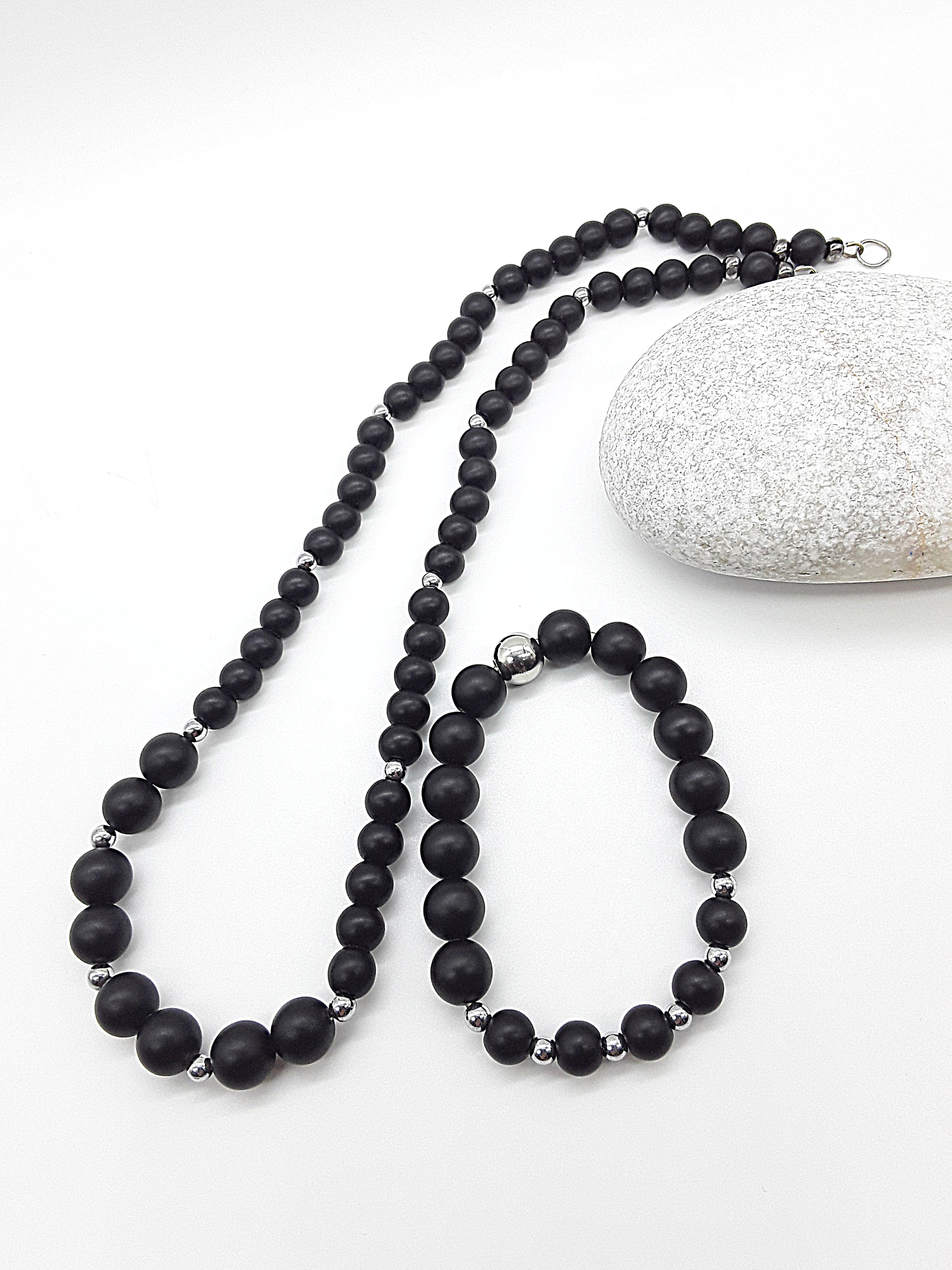 The Shadowguard Set by Polmadeva – matte black onyx and polished hematite necklace and bracelet symbolizing balance, strength, and timeless elegance