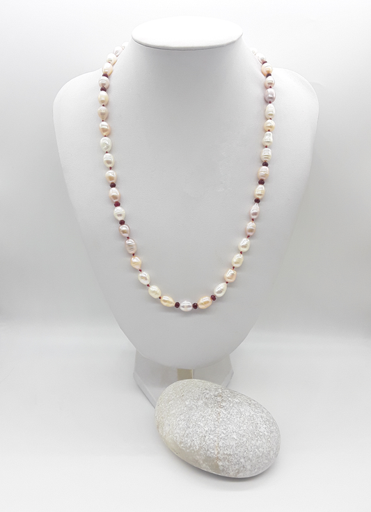 The Pearl of Fire Necklace by Polmadeva – freshwater pearls and ruby beads necklace symbolizing elegance, passion, and rebirth