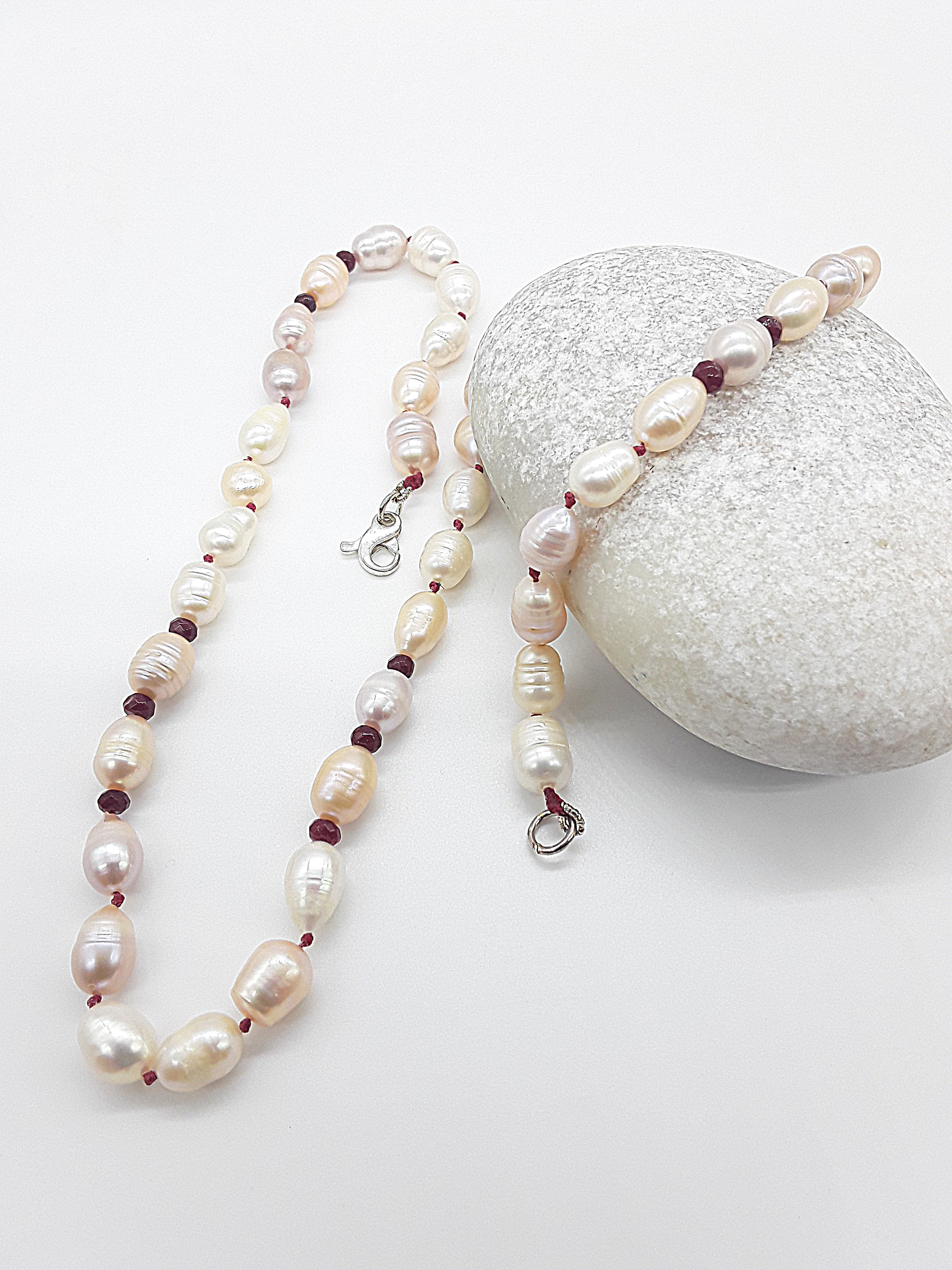 The Pearl of Fire Necklace by Polmadeva – freshwater pearls and ruby beads necklace symbolizing elegance, passion, and rebirth