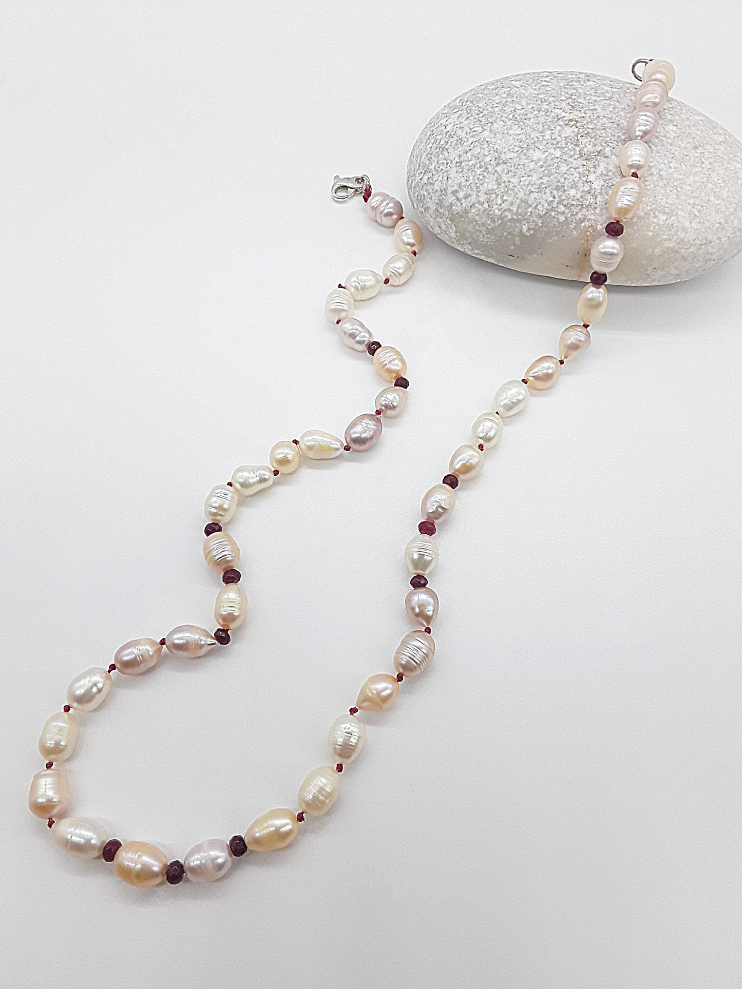 The Pearl of Fire Necklace by Polmadeva – freshwater pearls and ruby beads necklace symbolizing elegance, passion, and rebirth