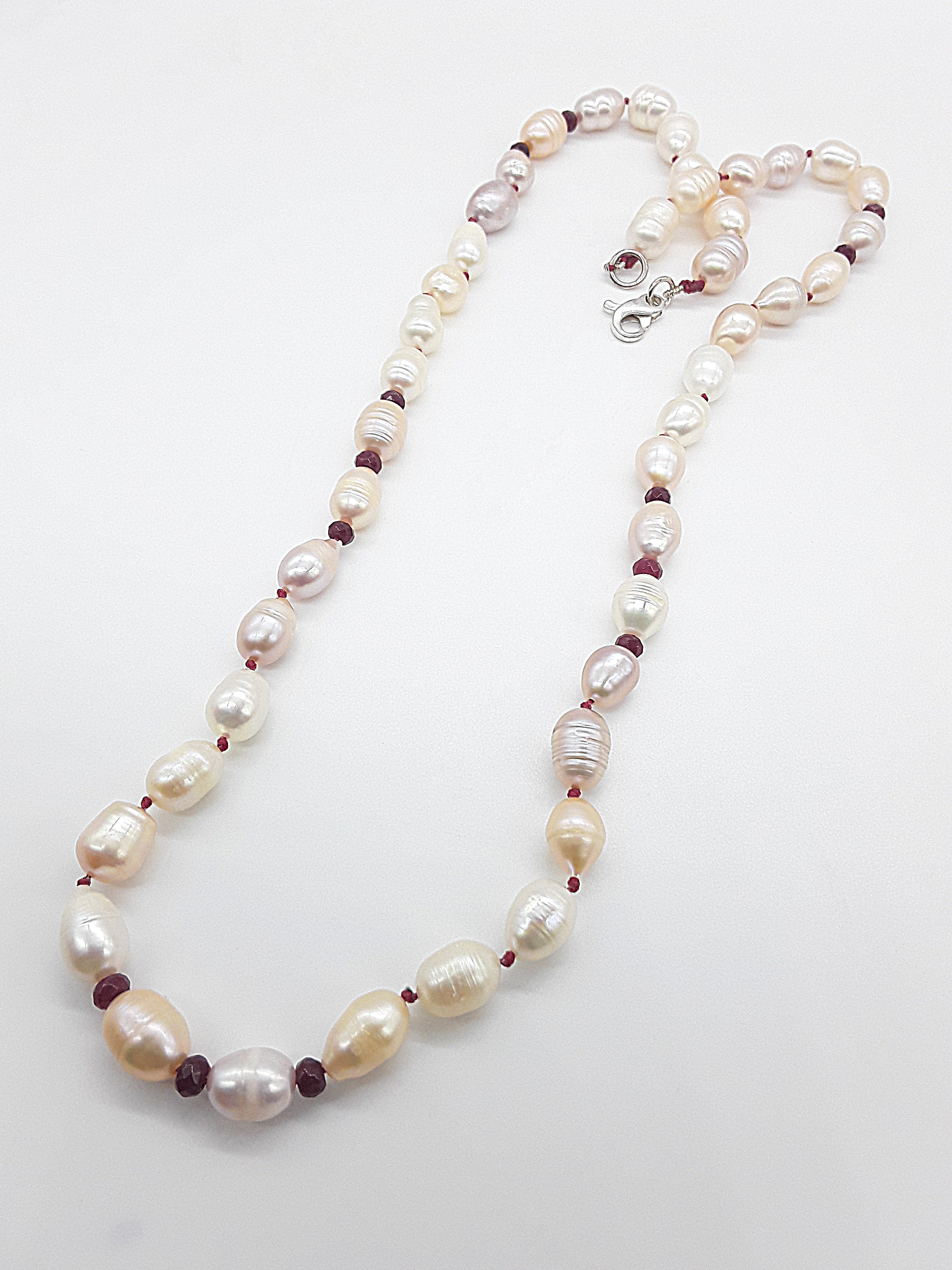 The Pearl of Fire Necklace by Polmadeva – freshwater pearls and ruby beads necklace symbolizing elegance, passion, and rebirth