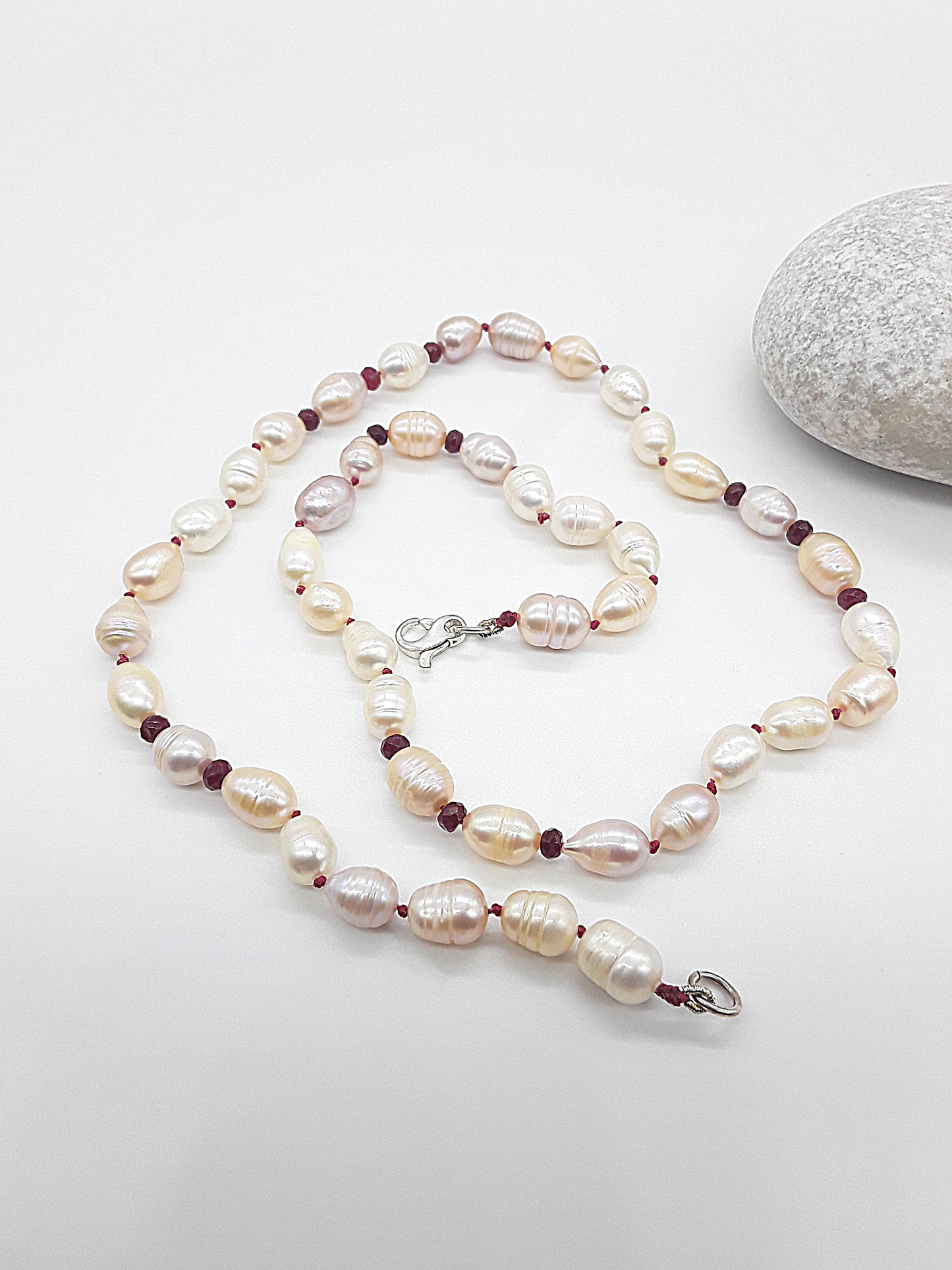 The Pearl of Fire Necklace by Polmadeva – freshwater pearls and ruby beads necklace symbolizing elegance, passion, and rebirth