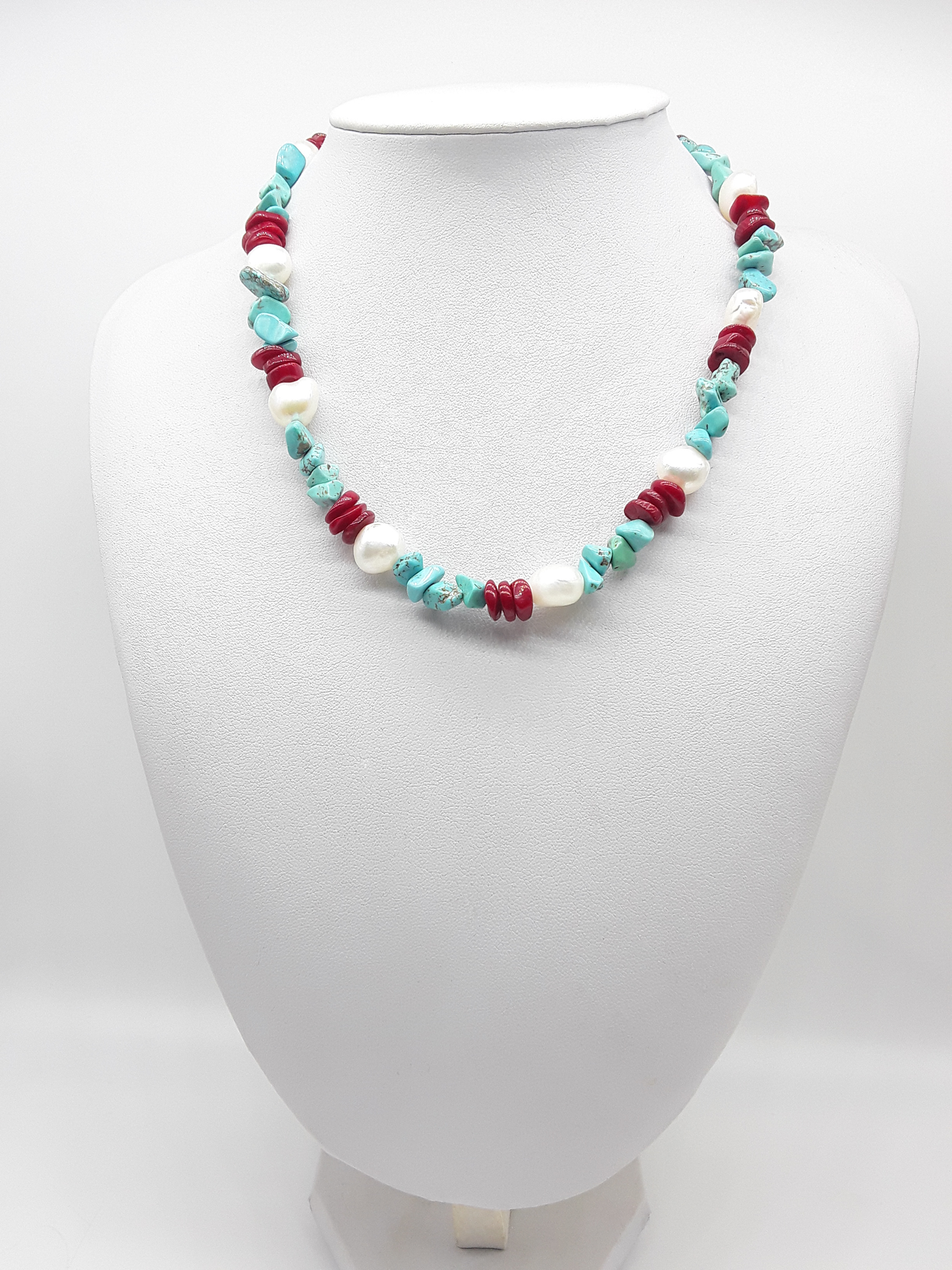 The Ocean’s Renewal Necklace by Polmadeva – turquoise, pearl and red coral necklace symbolizing the ocean’s rhythm and renewal